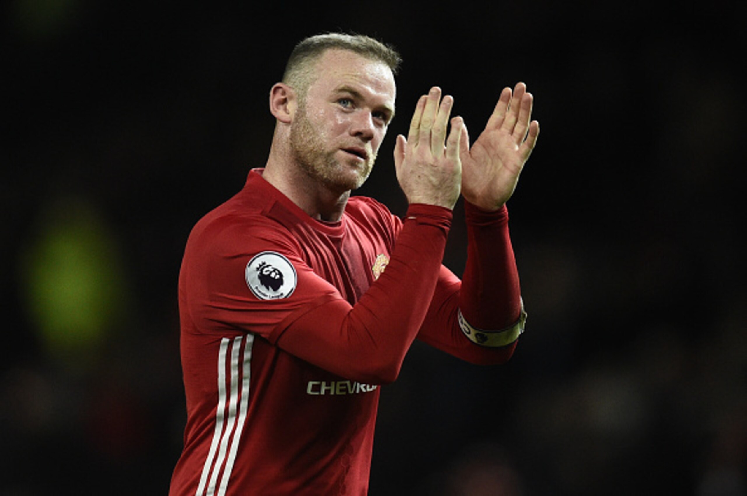 Manchester United's English striker Wayne Rooney applauds the fans following the English Premier League football match between Manchester United and Hull City at Old Trafford in Manchester, north west England, on February 1, 2017.
The match ended in a dra