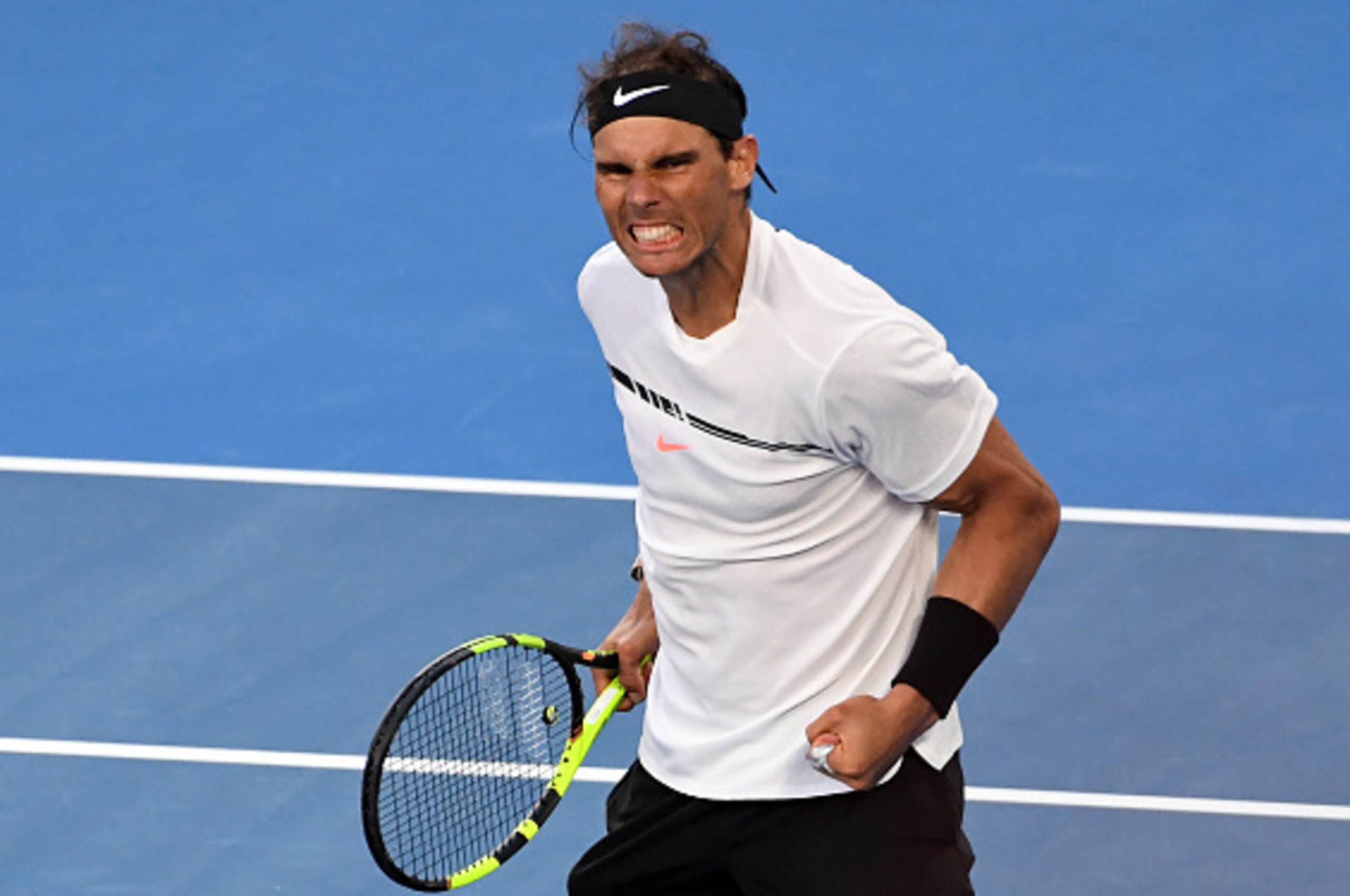 Spain's Rafael Nadal celebrates his victory over Russia's Alexander Zverev in their men's singles third round match on day six of the Australian Open tennis tournament in Melbourne on January 21, 2017. / AFP / SAEED KHAN / --IMAGE RESTRICTED TO EDITORIAL Spain's Rafael Nadal celebrates his victory over Russia's Alexander Zverev in their men's singles third round match on day six of the Australian Open tennis tournament in Melbourne on January 21, 2017. / AFP / SAEED KHAN / --IMAGE RESTRICTED TO EDITORIAL