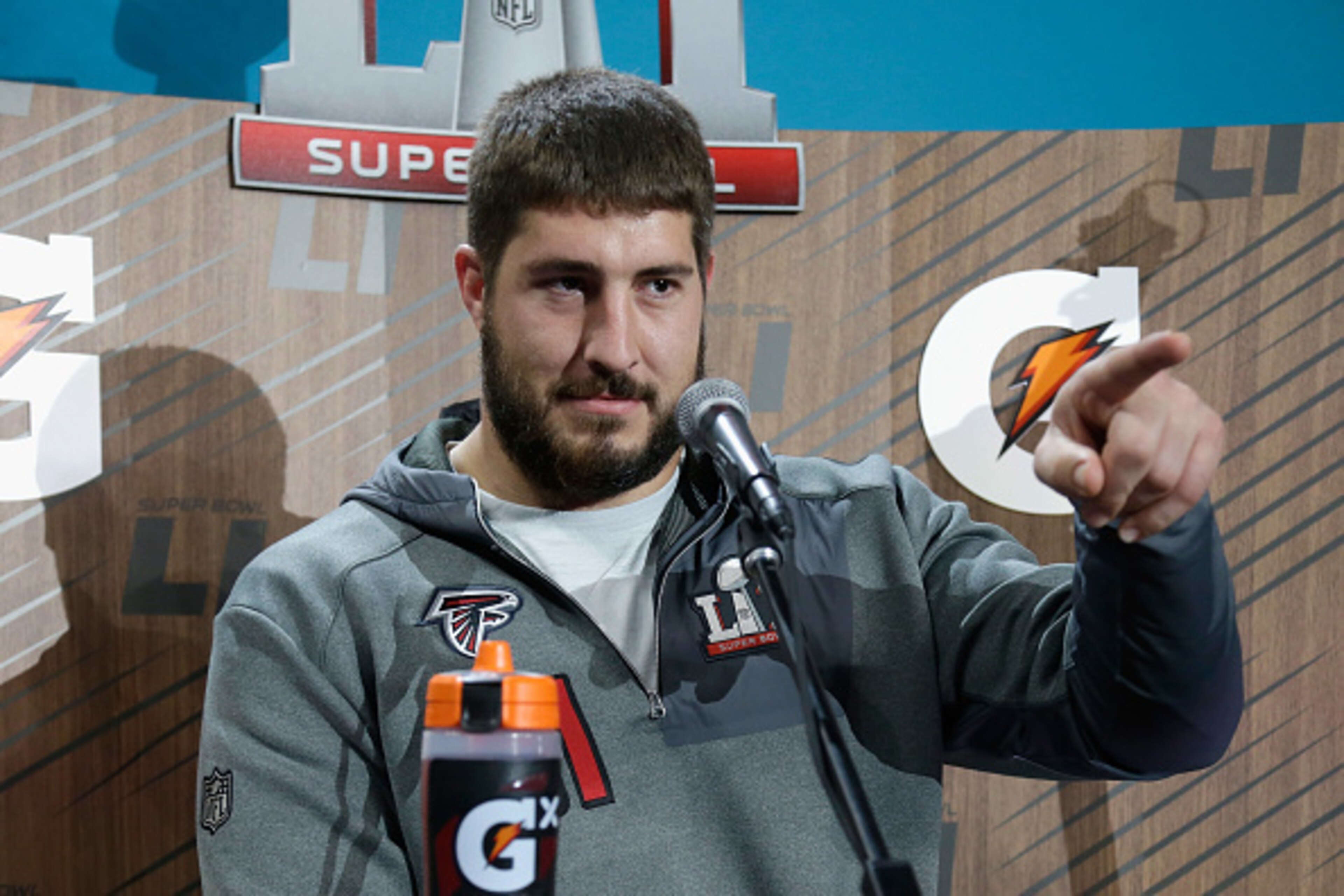 HOUSTON, TX - JANUARY 30:  Alex Mack #51 of the Atlanta Falcons speaks with the media during Super Bowl 51 Opening Night at Minute Maid Park on January 30, 2017 in Houston, Texas.  (Photo by Bob Levey/Getty Images)