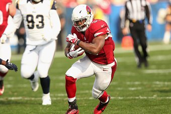 LOS ANGELES, CA - JANUARY 01:  Running back David Johnson #31 of the Arizona Cardinals carries the ball against the Los Angeles Rams at Los Angeles Memorial Coliseum on January 1, 2017 in Los Angeles, California.  (Photo by Stephen Dunn/Getty Images)