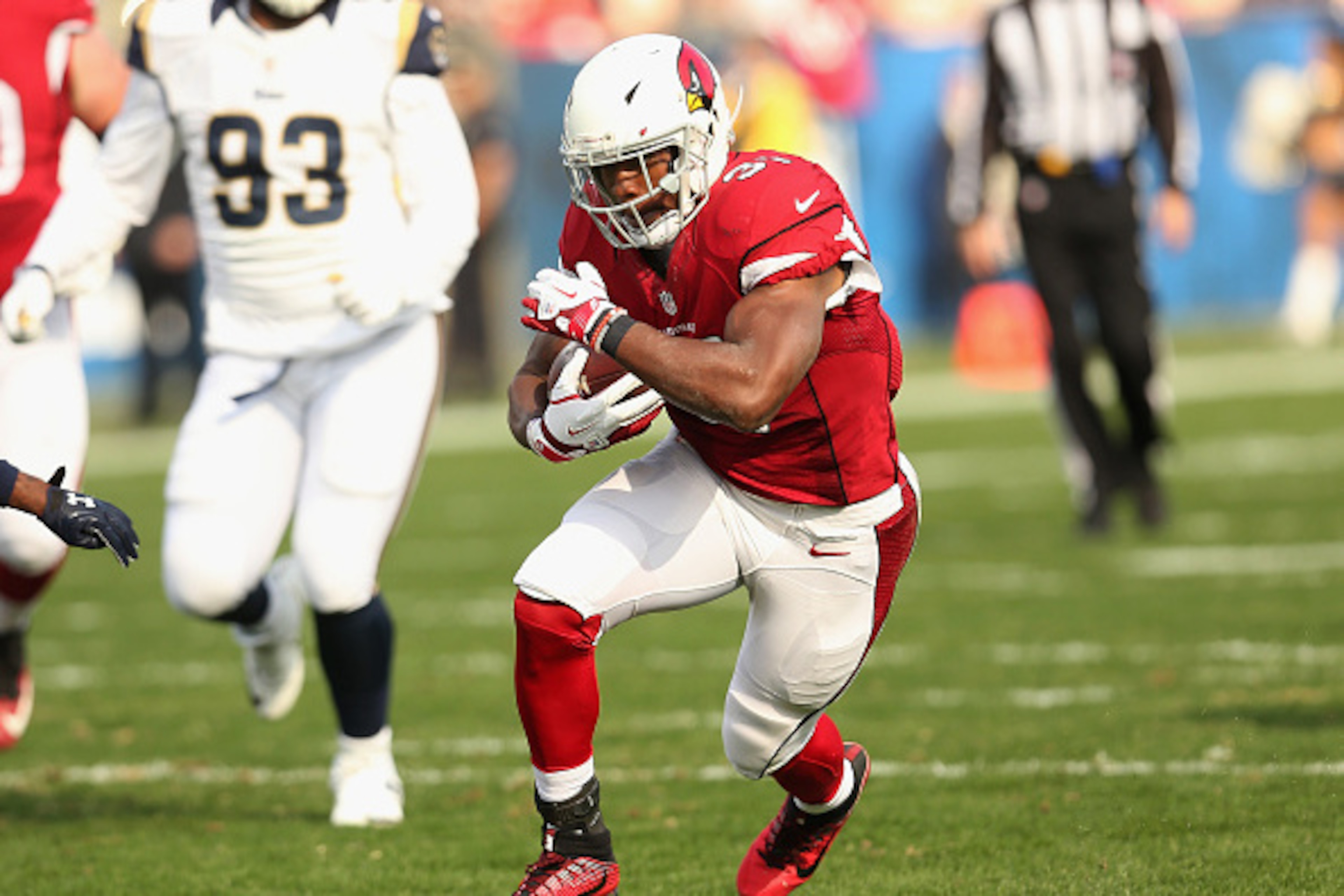 LOS ANGELES, CA - JANUARY 01: Running back David Johnson #31 of the Arizona Cardinals carries the ball against the Los Angeles Rams at Los Angeles Memorial Coliseum on January 1, 2017 in Los Angeles, California. (Photo by Stephen Dunn/Getty Images) LOS ANGELES, CA - JANUARY 01: Running back David Johnson #31 of the Arizona Cardinals carries the ball against the Los Angeles Rams at Los Angeles Memorial Coliseum on January 1, 2017 in Los Angeles, California. (Photo by Stephen Dunn/Getty Images)