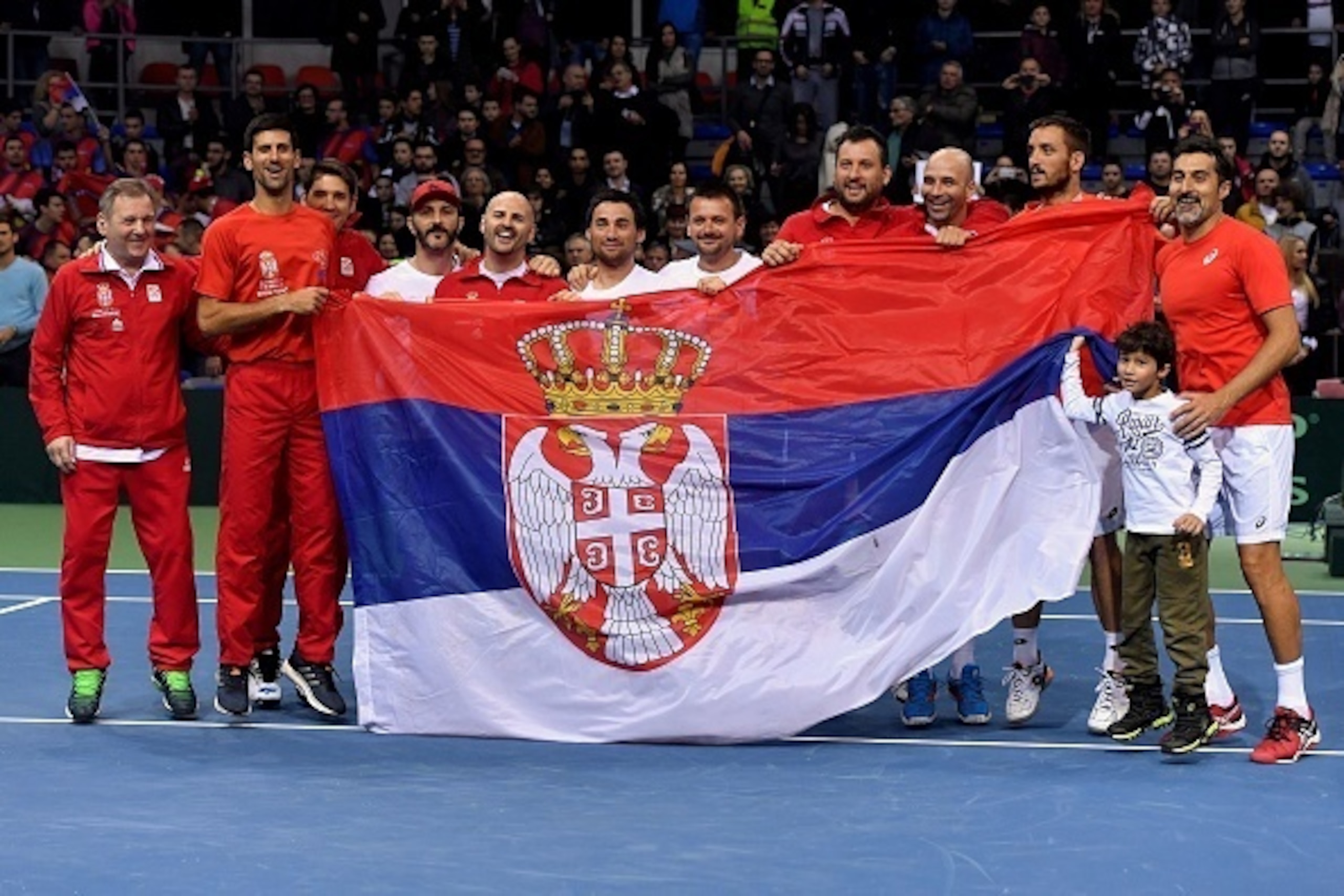 Serbia's tennis team celebrate their victory against Russia during the first round Davis Cup World Group  tennis tournament at Cair sports hall in Nis, on February 4, 2017. 
Serbia, the 2010 champions, will meet either Spain or Croatia in April's quarter-
