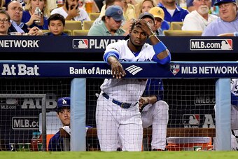 LOS ANGELES, CA - OCTOBER 19:  Yasiel Puig #66 of the Los Angeles Dodgers looks on from the dugout in the fifth inning against the Chicago Cubs in game four of the National League Championship Series at Dodger Stadium on October 19, 2016 in Los Angeles, C