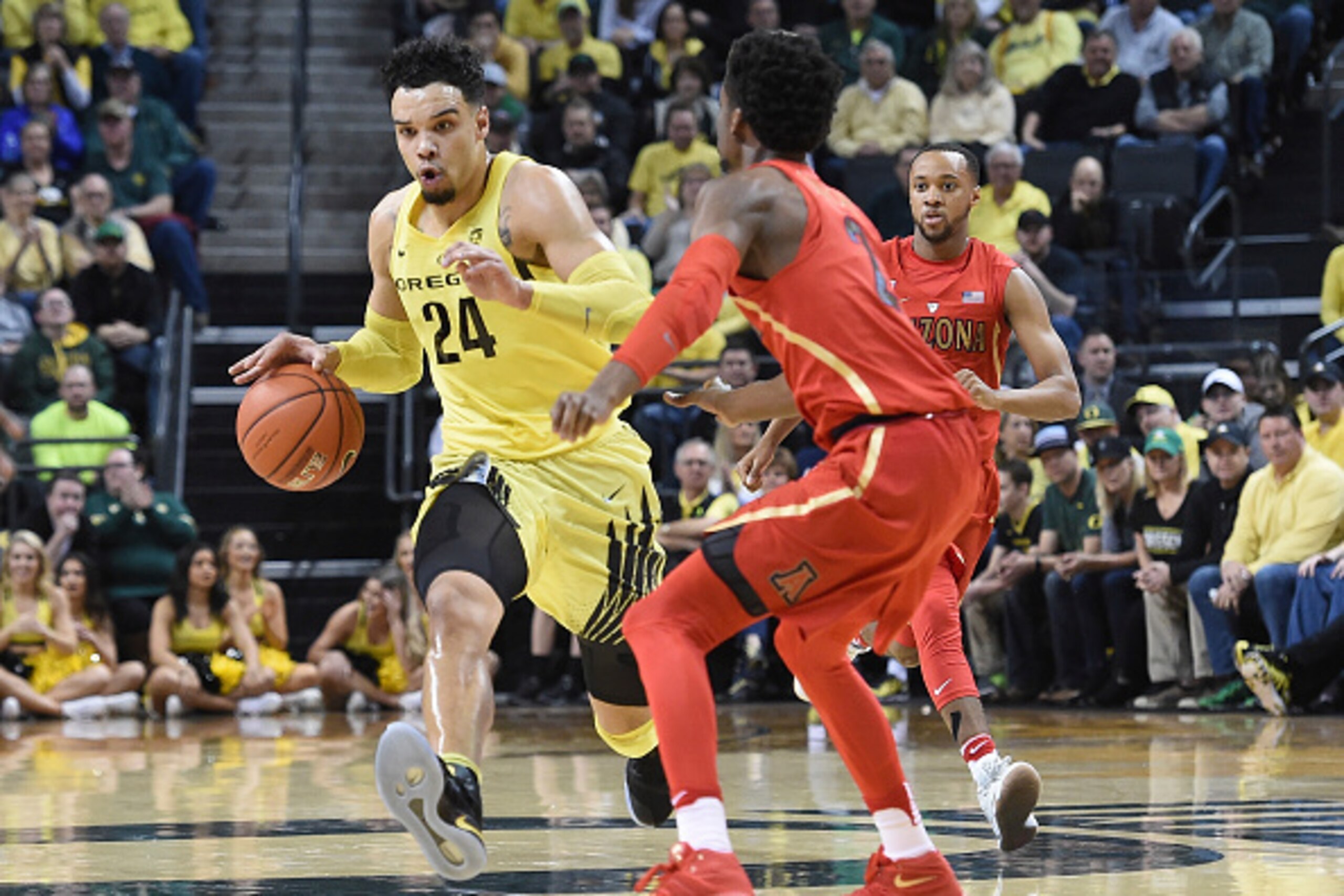 EUGENE, OR - FEBRUARY 04: Dillon Brooks #24 of the Oregon Ducks dribbles the ball up court on Kobi Simmons #2 of the Arizona Wildcats during the first half of the game at Matthew Knight Arena on February 4, 2017 in Eugene, Oregon. Oregon won the game 85-5