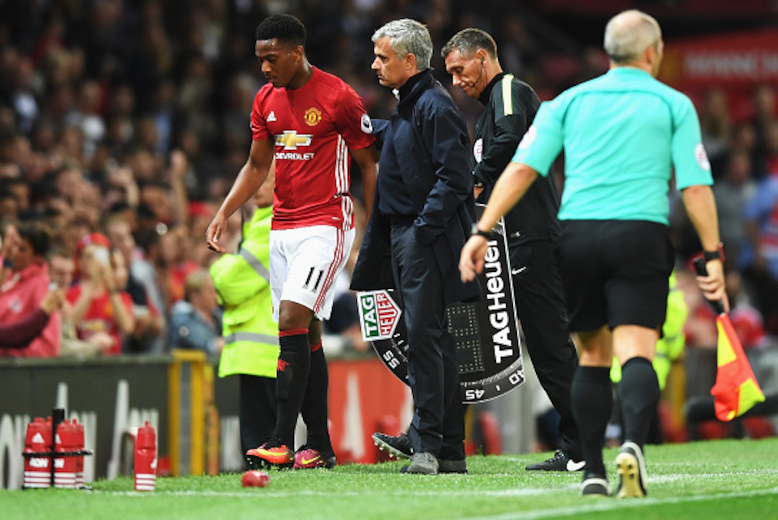 MANCHESTER, ENGLAND - AUGUST 19:  Anthony Martial of Manchester United is substituted by Jose Mourinho, Manager of Manchester United during the Premier League match between Manchester United and Southampton at Old Trafford on August 19, 2016 in Manchester