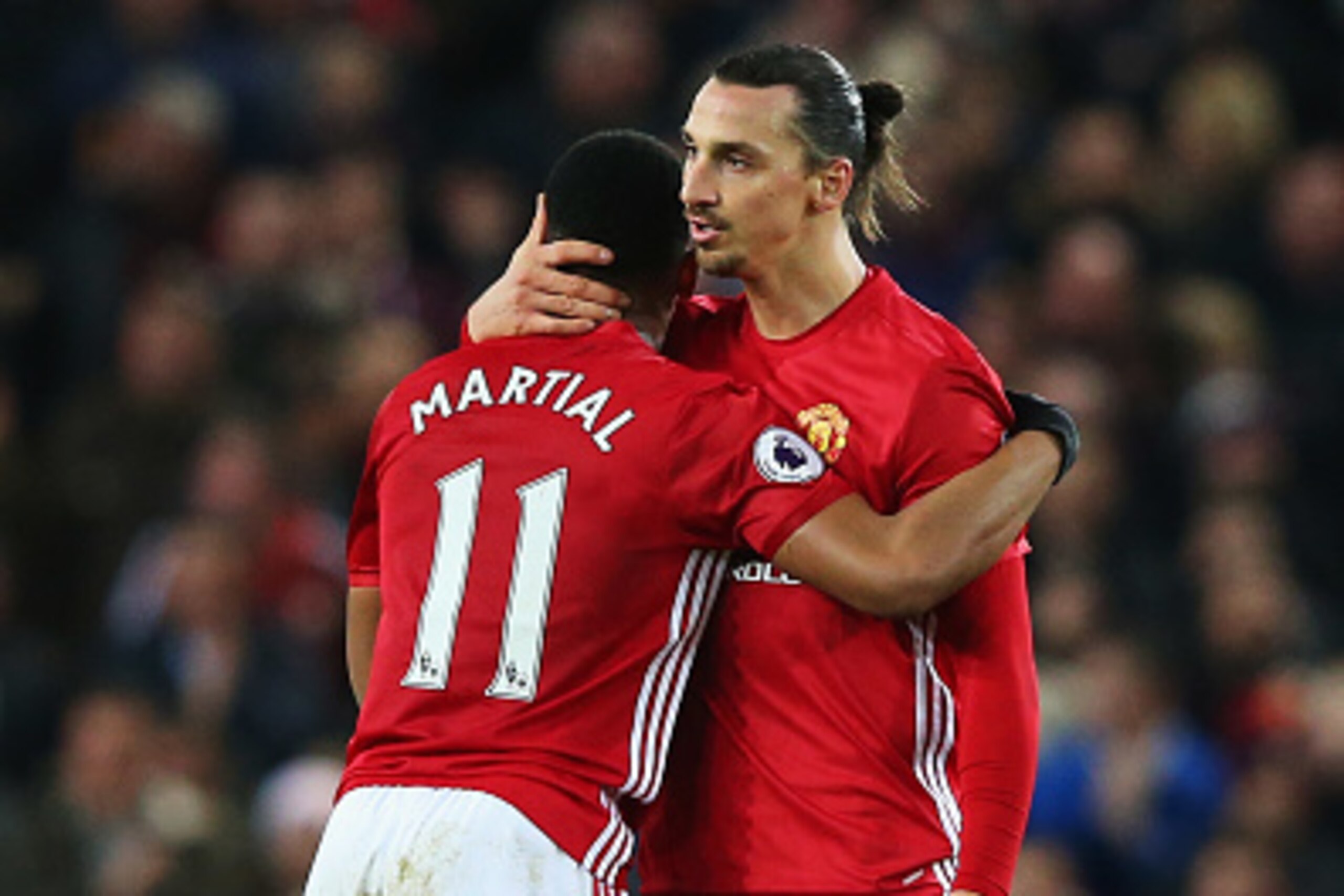 MANCHESTER, ENGLAND - DECEMBER 31:  Anthony Martial of Manchester United celebrates after he scores a goal with team mate Zlatan Ibrahimovic during the Premier League match between Manchester United and Middlesbrough at Old Trafford on December 31, 2016 i