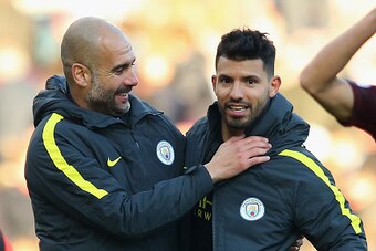BURNLEY, ENGLAND - NOVEMBER 26:  Josep Guardiola, Manager of Manchester City congratulates Sergio Aguero after their 2-1 win in the Premier League match between Burnley and Manchester City at Turf Moor on November 26, 2016 in Burnley, England.  (Photo by 