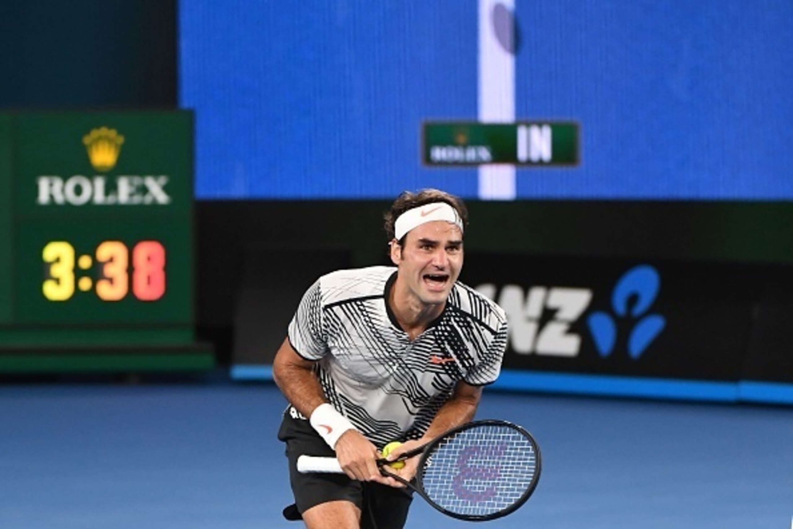 Switzerland's Roger Federer celebrates his victory against Spain's Rafael Nadal during the men's singles final on day 14 of the Australian Open tennis tournament in Melbourne on January 29, 2017. / AFP / WILLIAM WEST / IMAGE RESTRICTED TO EDITORIAL USE - 
