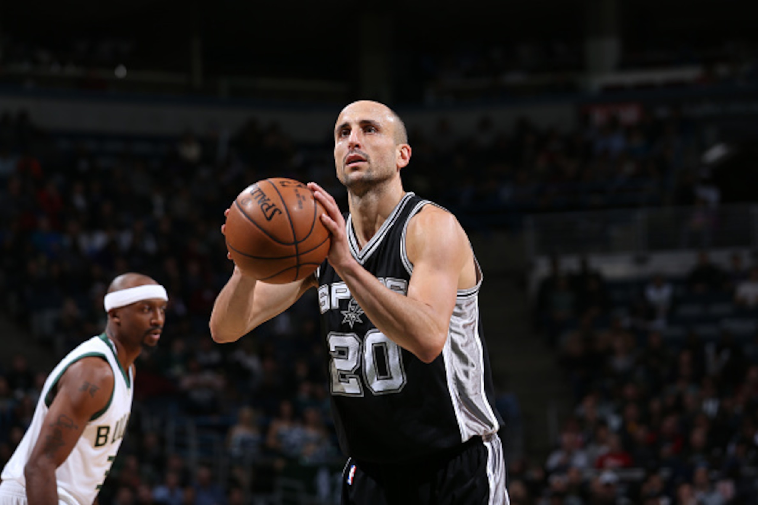 Milwaukee, WI - DECEMBER 5:  Manu Ginobili #20 of the San Antonio Spurs shoots a free throw during a game against the Milwaukee Bucks on December 5, 2016 at the BMO Harris Bradley Center in Milwaukee, Wisconsin. NOTE TO USER: User expressly acknowledges a