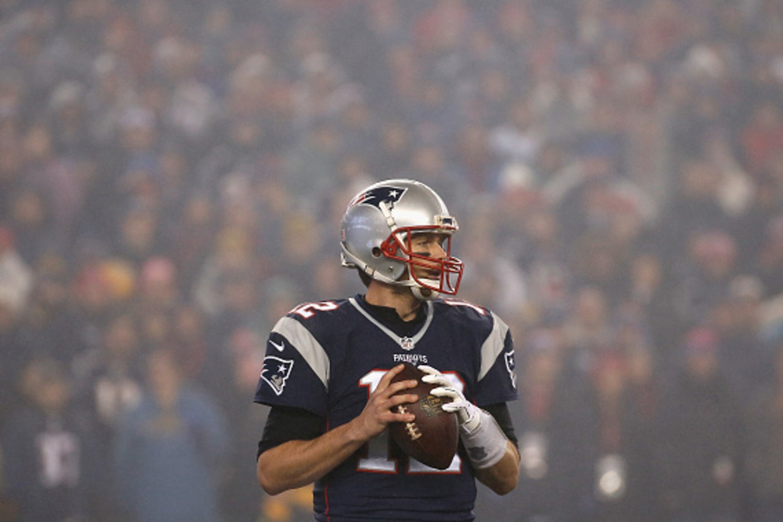FOXBORO, MA - JANUARY 22:  Tom Brady #12 of the New England Patriots looks to pass the ball against the Pittsburgh Steelers in the AFC Championship Game at Gillette Stadium on January 22, 2017 in Foxboro, Massachusetts.  (Photo by Jim Rogash/Getty Images)
