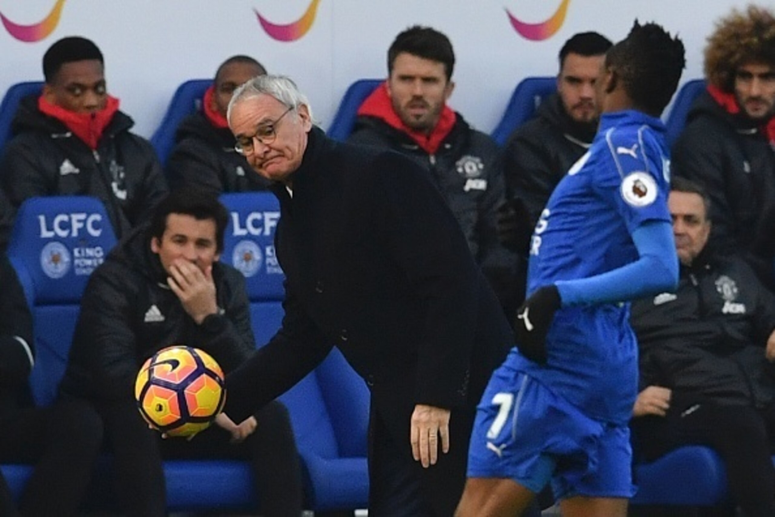 Leicester City's Italian manager Claudio Ranieri retrieves the ball during the English Premier League football match between Leicester City and Manchester United at King Power Stadium in Leicester, central England on February 5, 2017. / AFP / Ben STANSALL