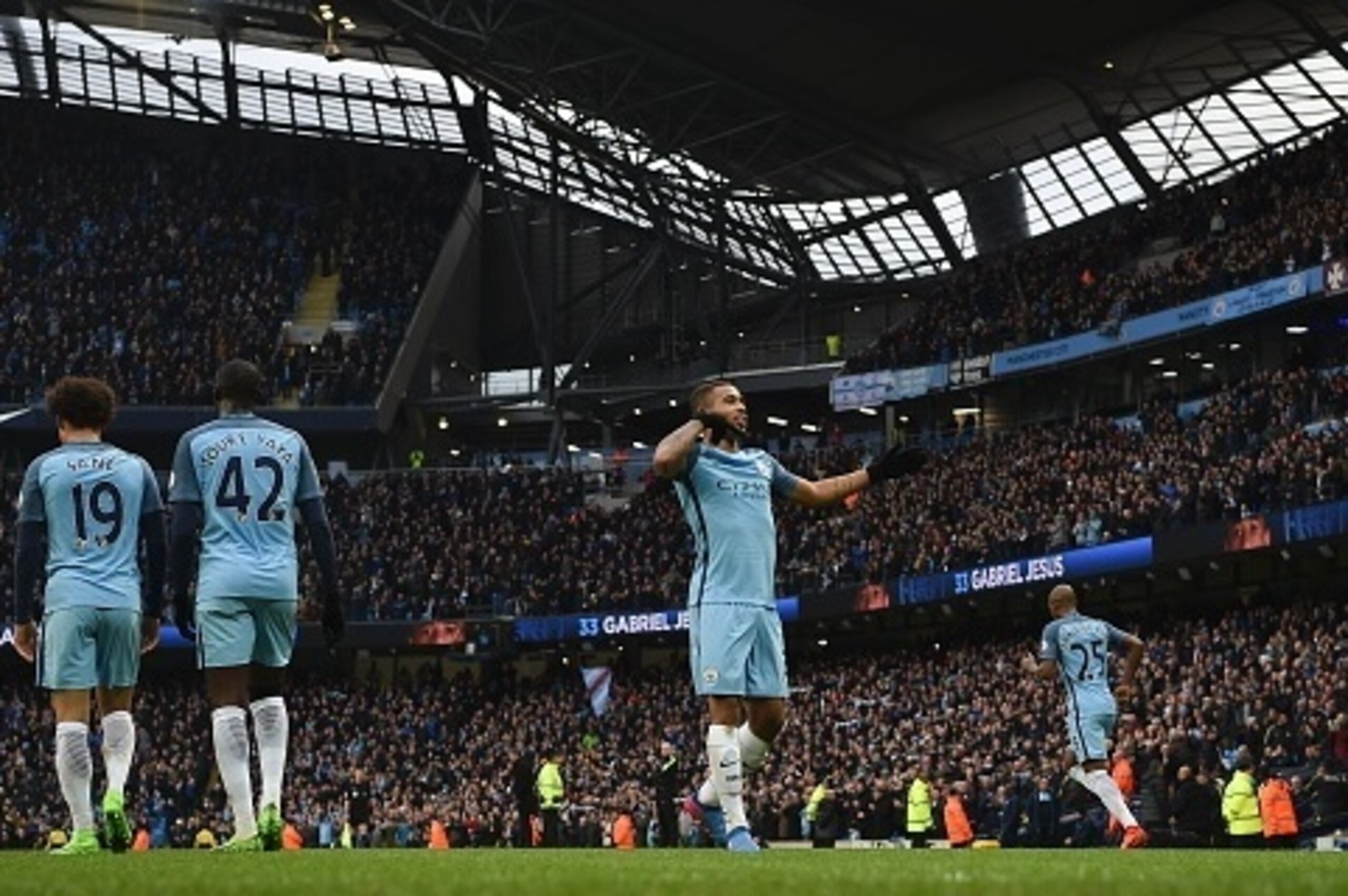 Manchester City's Brazilian striker Gabriel Jesus (C) celebrates after scoring their late winning goal during the English Premier League football match between Manchester City and Swansea City at the Etihad Stadium in Manchester, north west England, on Fe