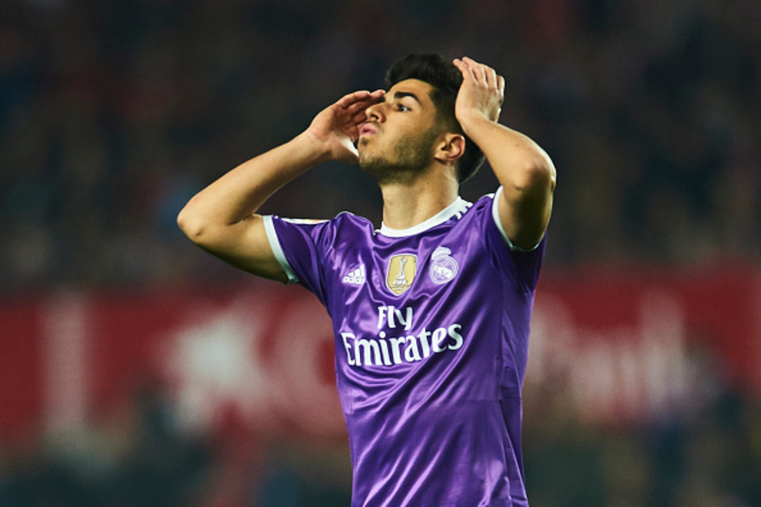 SEVILLE, SPAIN - JANUARY 12:  Marco Asensio of Real Madrid CF reacts during the Copa del Rey Round of 16 Second Leg match between Sevilla FC vs Real Madrid CF at Ramon Sanchez Pizjuan stadium on January 12, 2017 in Seville, Spain.  (Photo by Aitor Alcalde