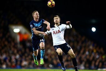 LONDON, ENGLAND - FEBRUARY 04:  Eric Dier of Tottenham Hotspur battles for the ball with Adam Forshaw of Middlesbrough during the Premier League match between Tottenham Hotspur and Middlesbrough at White Hart Lane on February 4, 2017 in London, England.  