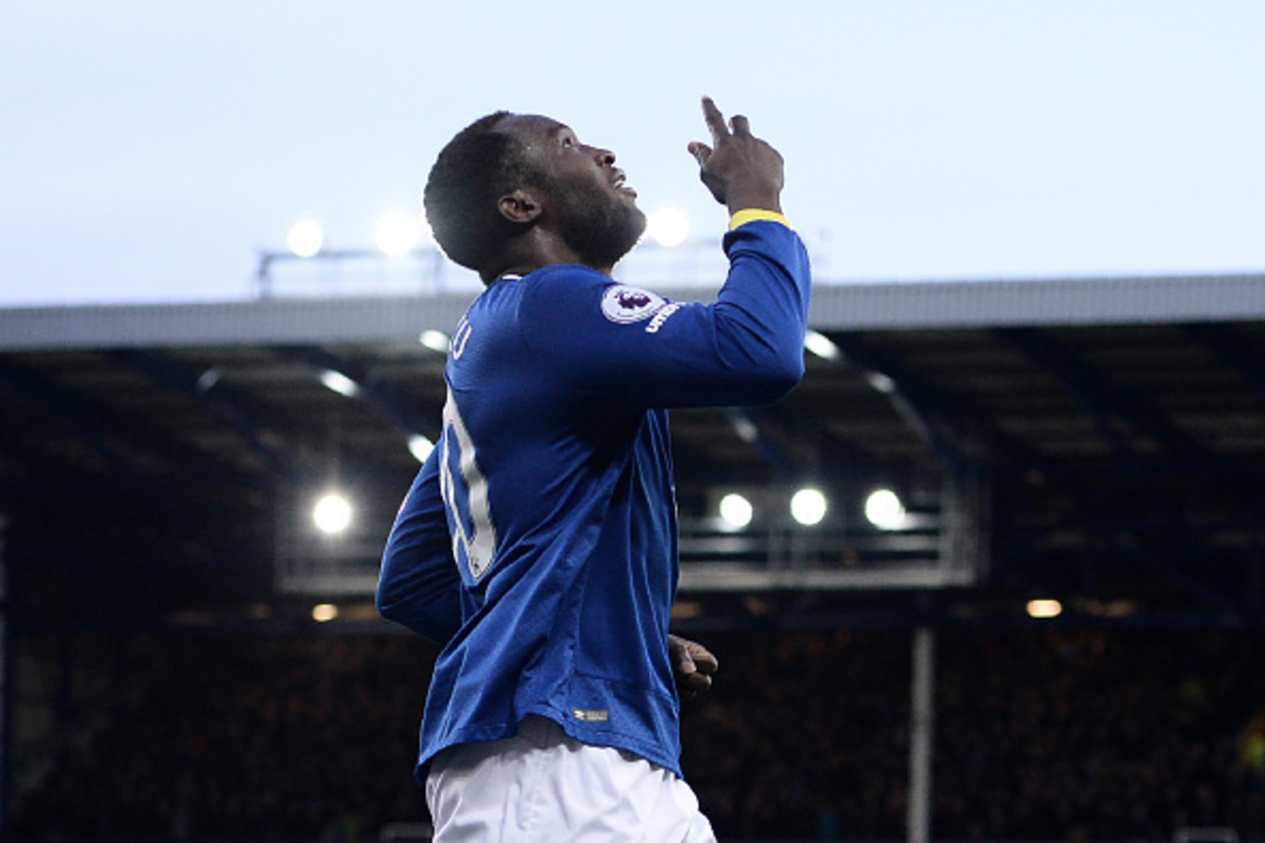 Everton's Belgian striker Romelu Lukaku celebrates after scoring their fourth goal, his third during the English Premier League football match between Everton and Bournemouth at Goodison Park in Liverpool, north west England on February 4, 2017. / AFP / O
