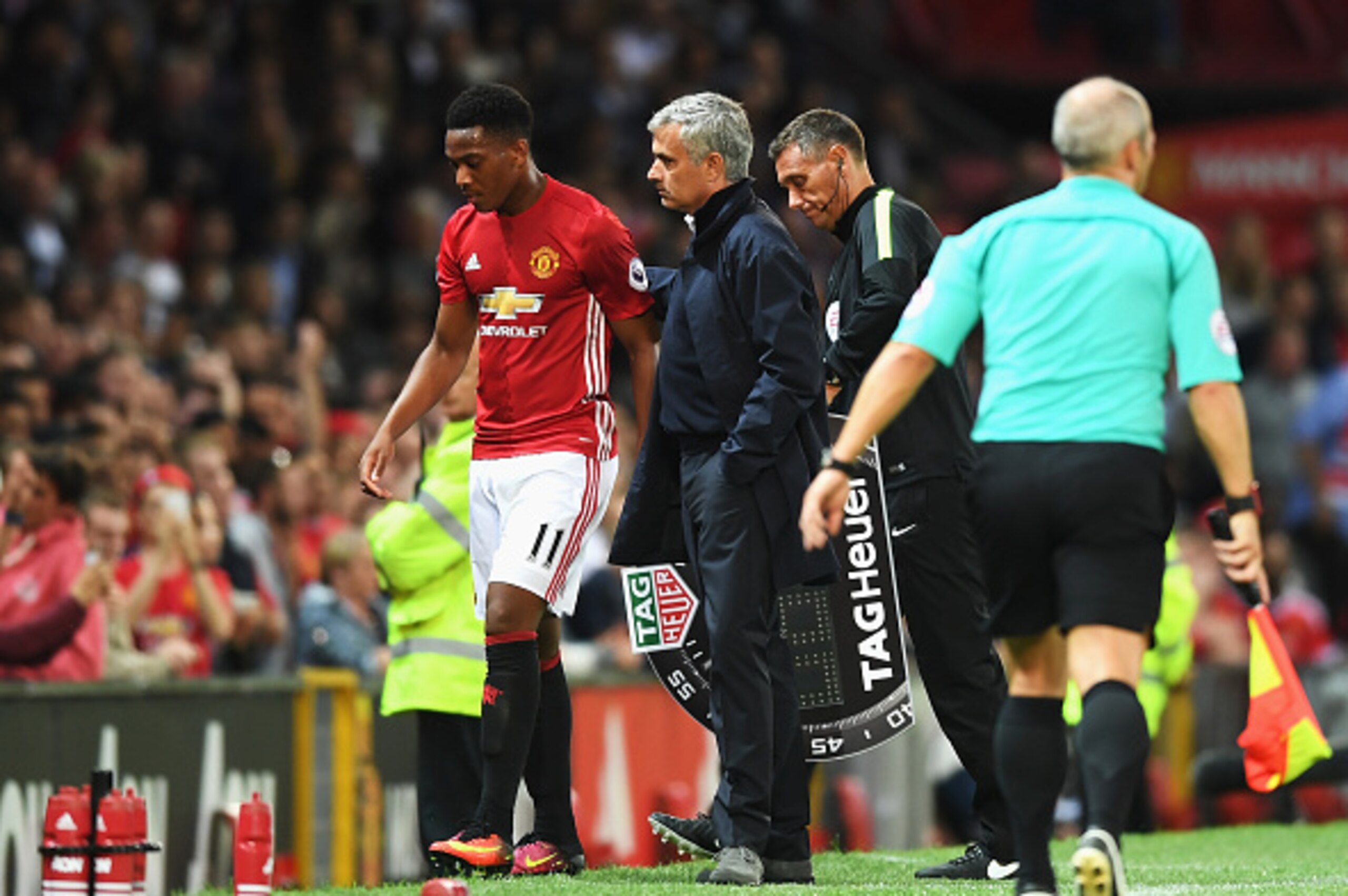 MANCHESTER, ENGLAND - AUGUST 19:  Anthony Martial of Manchester United is substituted by Jose Mourinho, Manager of Manchester United during the Premier League match between Manchester United and Southampton at Old Trafford on August 19, 2016 in Manchester