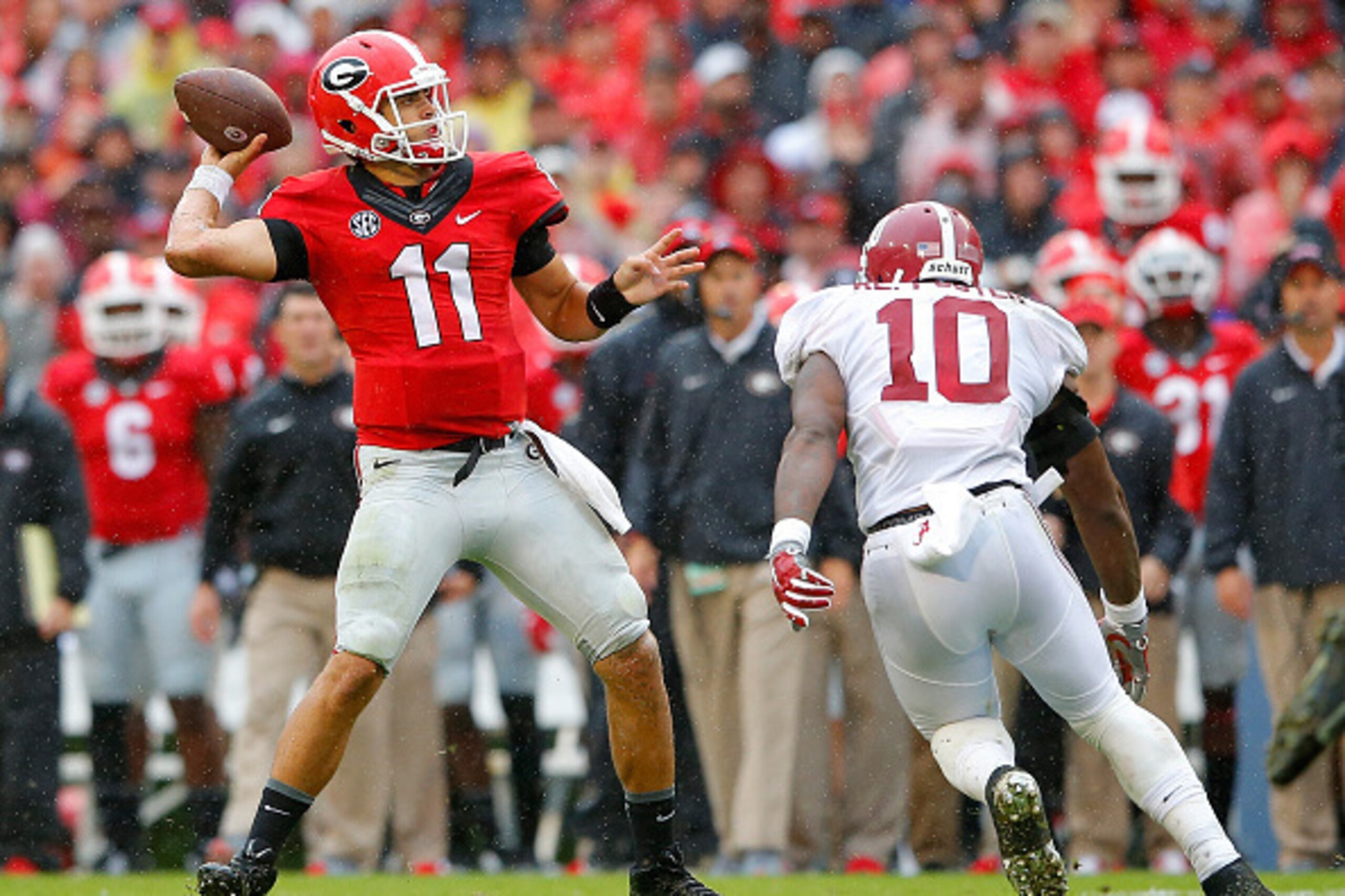 ATHENS, GA - OCTOBER 03:  Greyson Lambert #11 of the Georgia Bulldogs looks to pass against Reuben Foster #10 of the Alabama Crimson Tide at Sanford Stadium on October 3, 2015 in Athens, Georgia.  (Photo by Kevin C. Cox/Getty Images)