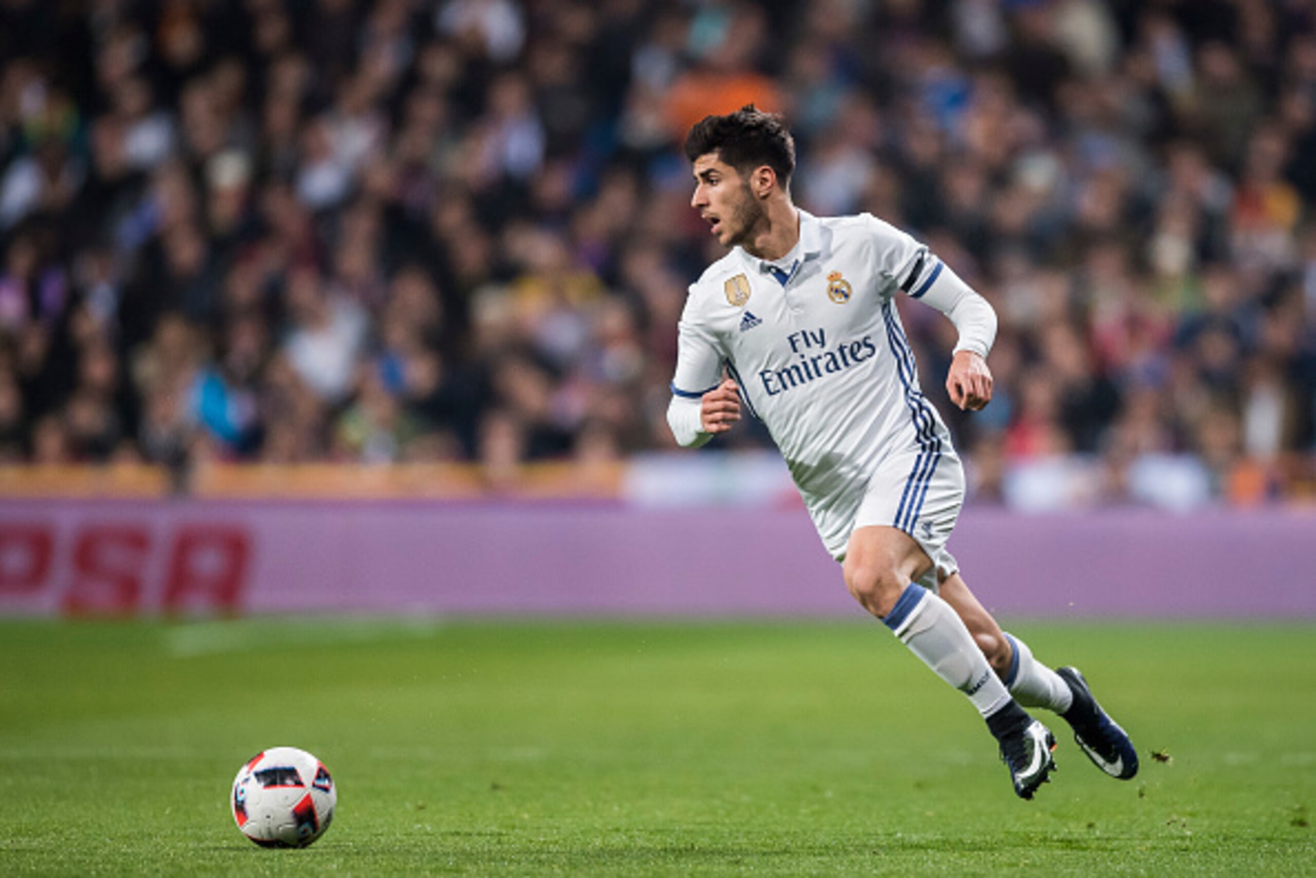 MADRID, SPAIN - JANUARY 04: Marco Asensio Willemsen of Real Madrid in action during their Copa del Rey Round of 16 match between Real Madrid and Sevilla FC at the Santiago Bernabeu Stadium on 04 January 2017 in Madrid, Spain. (Photo by Power Sport Images/