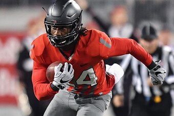 COLUMBUS, OH - NOVEMBER 5:  Malik Hooker #24 of the Ohio State Buckeyes runs with the ball against the Nebraska Cornhuskers at Ohio Stadium on November 5, 2016 in Columbus, Ohio. Ohio State defeated Nebraska 62-3.  (Photo by Jamie Sabau/Getty Images)