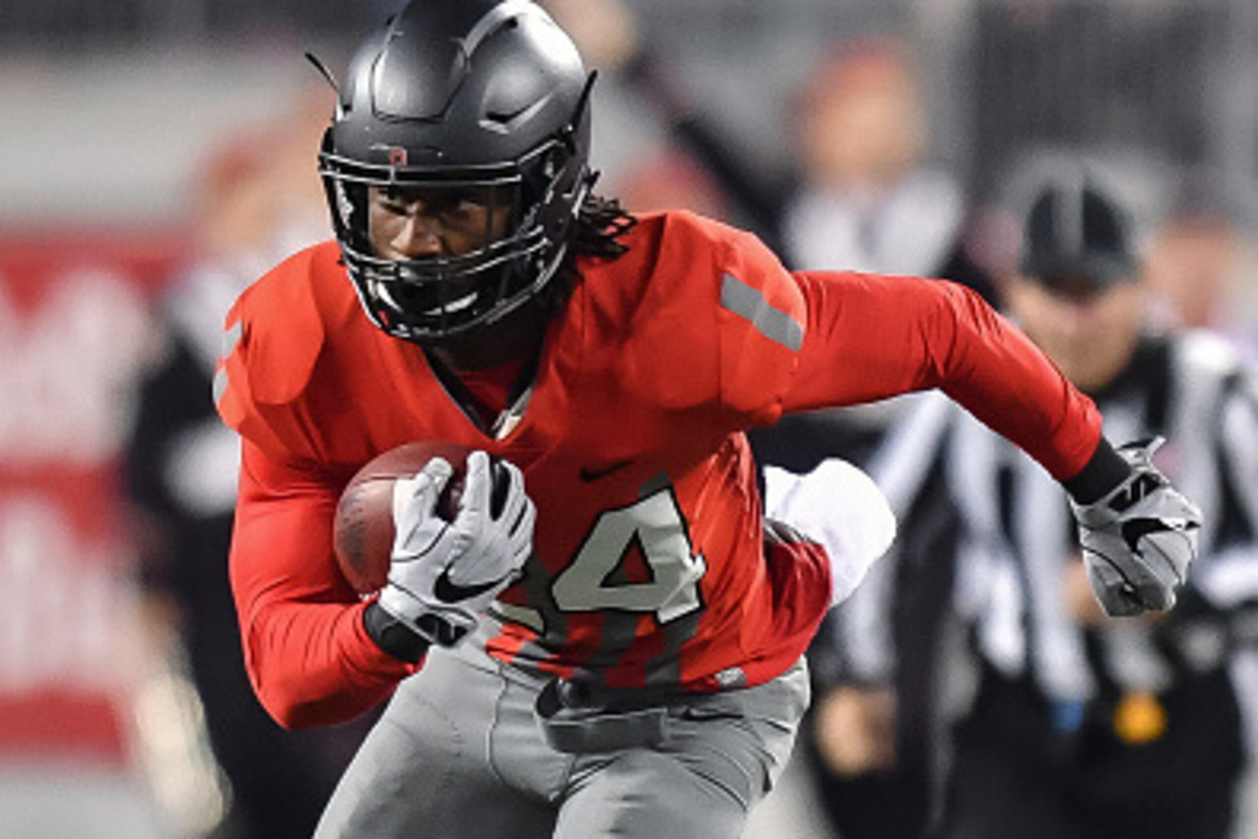 COLUMBUS, OH - NOVEMBER 5:  Malik Hooker #24 of the Ohio State Buckeyes runs with the ball against the Nebraska Cornhuskers at Ohio Stadium on November 5, 2016 in Columbus, Ohio. Ohio State defeated Nebraska 62-3.  (Photo by Jamie Sabau/Getty Images)