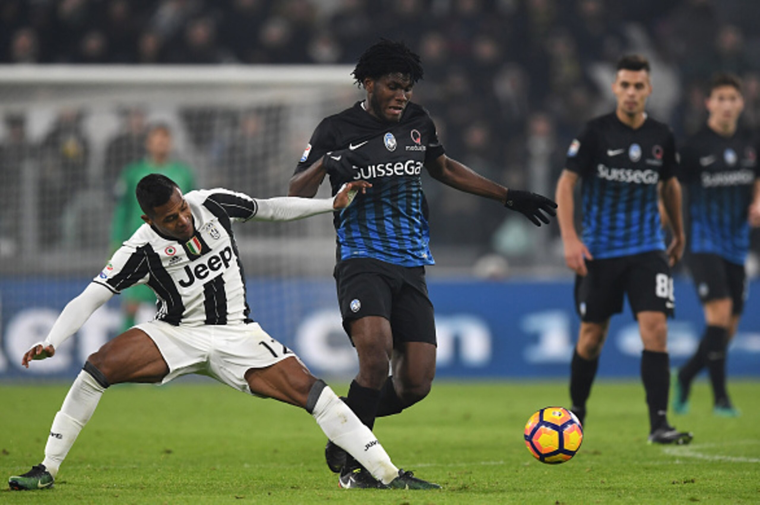 TURIN, ITALY - DECEMBER 03: Alex Sandro (L) of Juventus FC tackles Franck Kessie of Atalanta BC during the Serie A match between Juventus FC and Atalanta BC at Juventus Stadium on December 3, 2016 in Turin, Italy. (Photo by Valerio Pennicino/Getty Image TURIN, ITALY - DECEMBER 03: Alex Sandro (L) of Juventus FC tackles Franck Kessie of Atalanta BC during the Serie A match between Juventus FC and Atalanta BC at Juventus Stadium on December 3, 2016 in Turin, Italy. (Photo by Valerio Pennicino/Getty Image