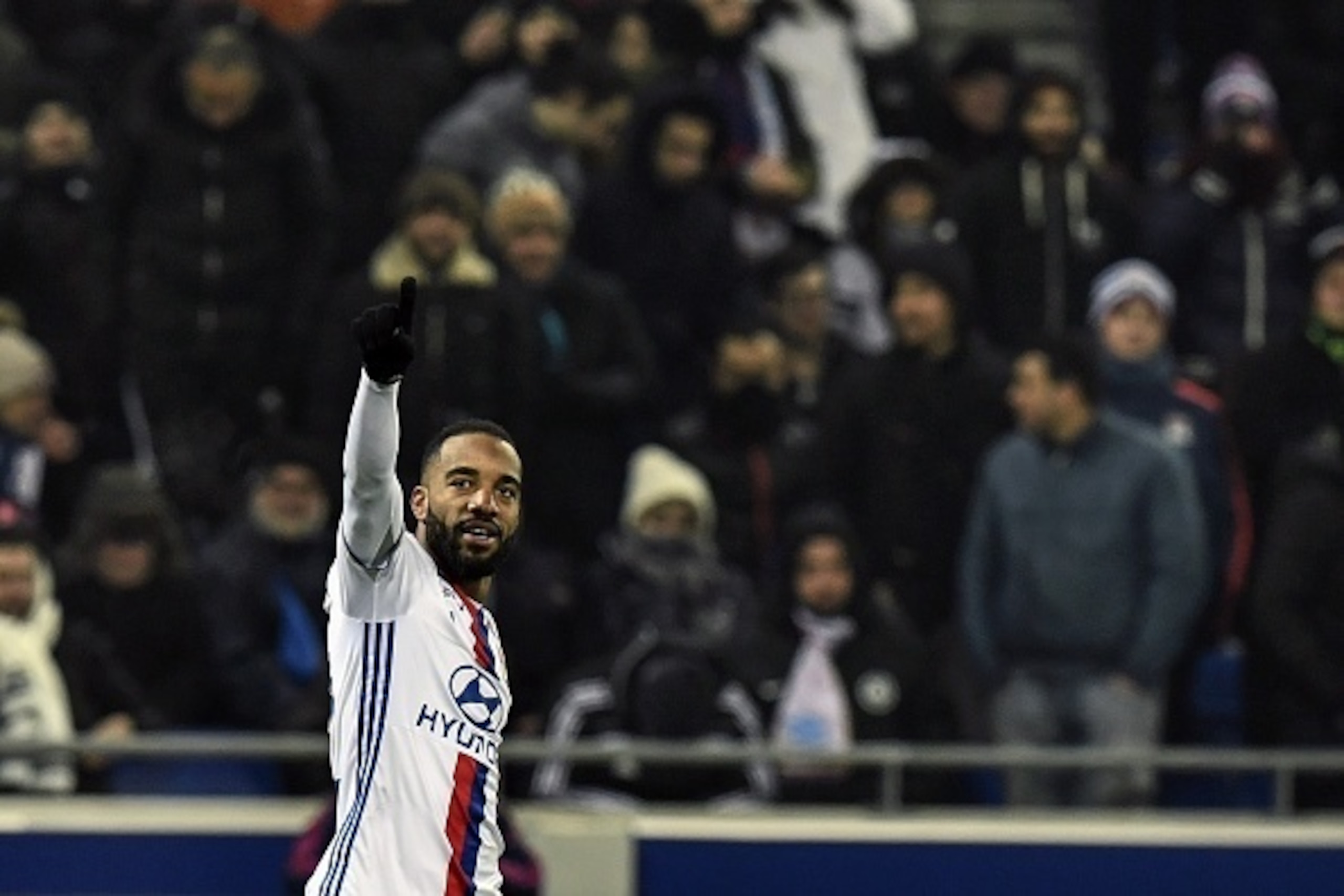 Lyon's French forward Alexandre Lacazette celebrates after scoring a goal during the French L1 football match Olympique Lyonnais (OL) vs Marseille (OM) on January 22, 2017, at the Parc Olympique Lyonnais stadium in Decines-Charpieu, central-eastern France