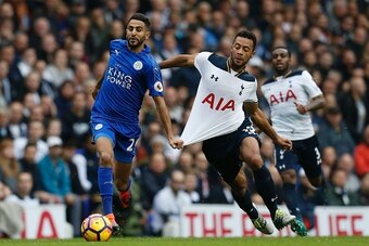 Leicester City's Algerian midfielder Riyad Mahrez (L) vies with Tottenham Hotspur's Belgian midfielder Mousa Dembele during the English Premier League football match between Tottenham Hotspur and Leicester City at White Hart Lane in London, on October 29,