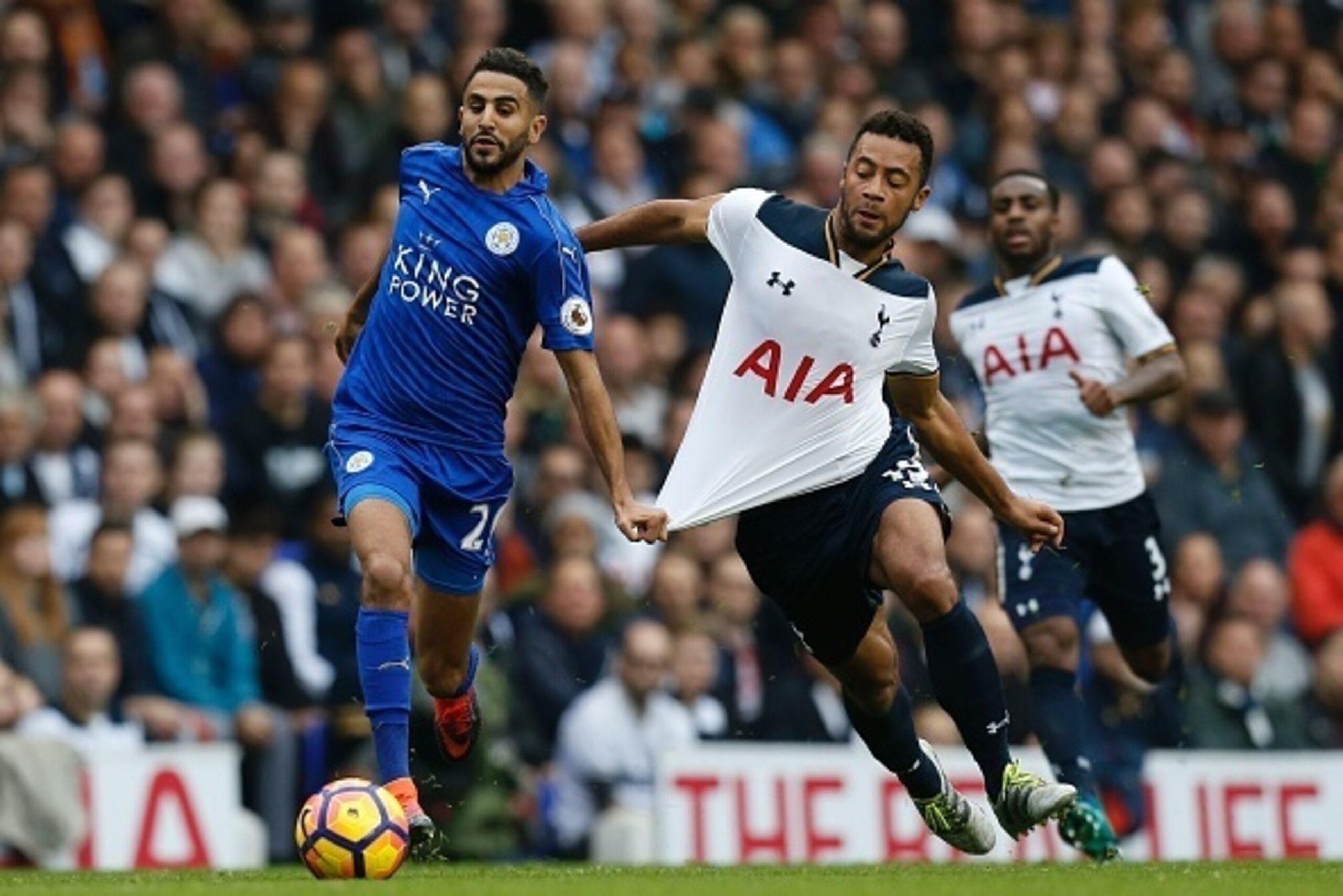 Leicester City's Algerian midfielder Riyad Mahrez (L) vies with Tottenham Hotspur's Belgian midfielder Mousa Dembele during the English Premier League football match between Tottenham Hotspur and Leicester City at White Hart Lane in London, on October 29,