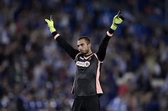 Espanyol's goalkeeper Paul Lopez celebrates a goal during the Spanish league football match RCD Espanyol vs Valencia CF at the Power8 stadium in Cornella de Llobregat on September 22, 2015. AFP PHOTO/ JOSEP LAGO        (Photo credit should read JOSEP LAGO