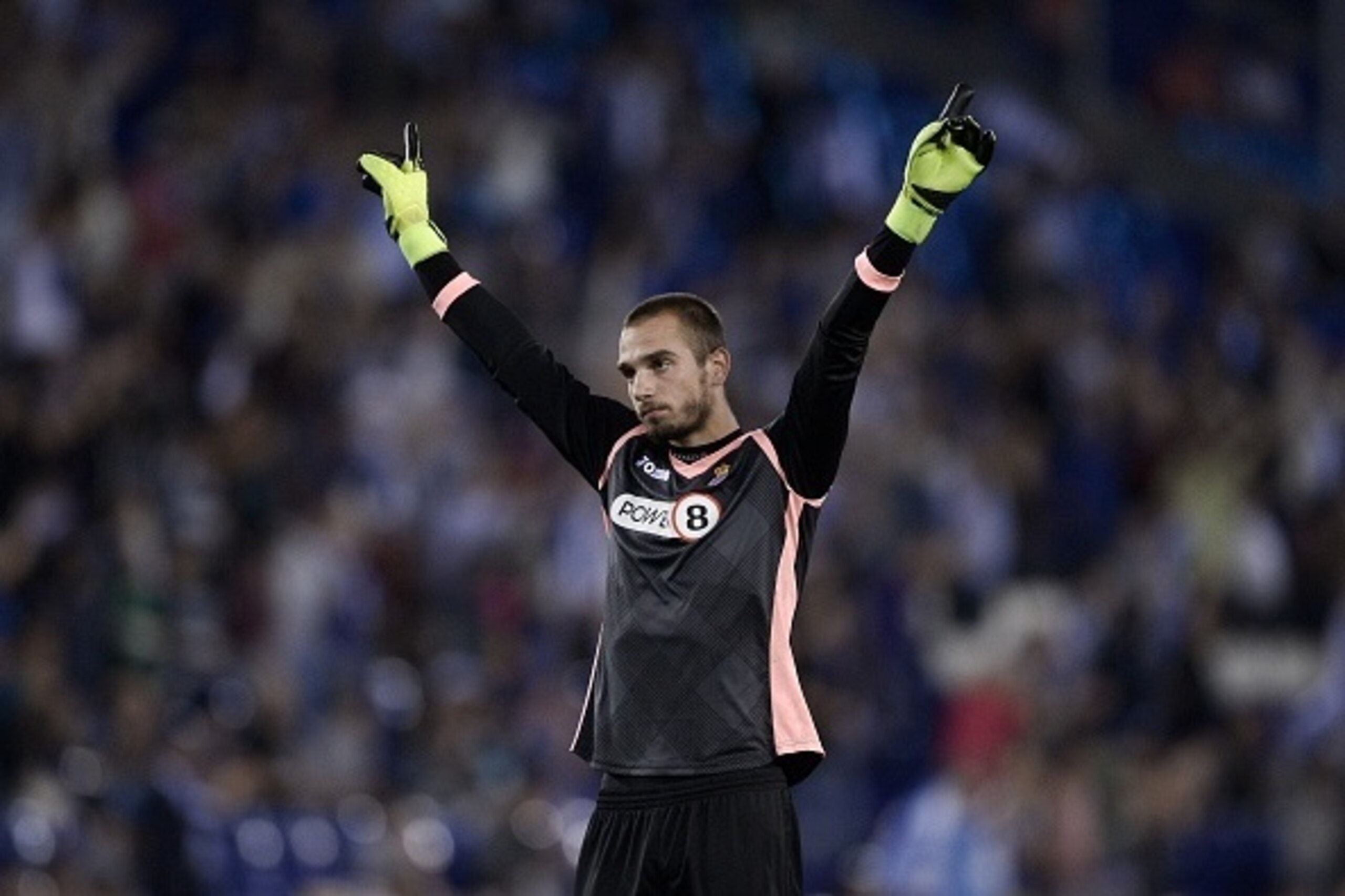Espanyol's goalkeeper Paul Lopez celebrates a goal during the Spanish league football match RCD Espanyol vs Valencia CF at the Power8 stadium in Cornella de Llobregat on September 22, 2015. AFP PHOTO/ JOSEP LAGO        (Photo credit should read JOSEP LAGO