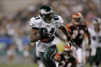 PHILADELPHIA - AUGUST 26: Wide Receiver Terrell Owens #81 of the Philadelphia Eagles runs with the ball at Lincoln Financial Field on August 26, 2005 in Philadelphia, Pennsylvania.  The Philadelphia Eagles defeated the Cincinnati Bengals 27-17. (Photo by 