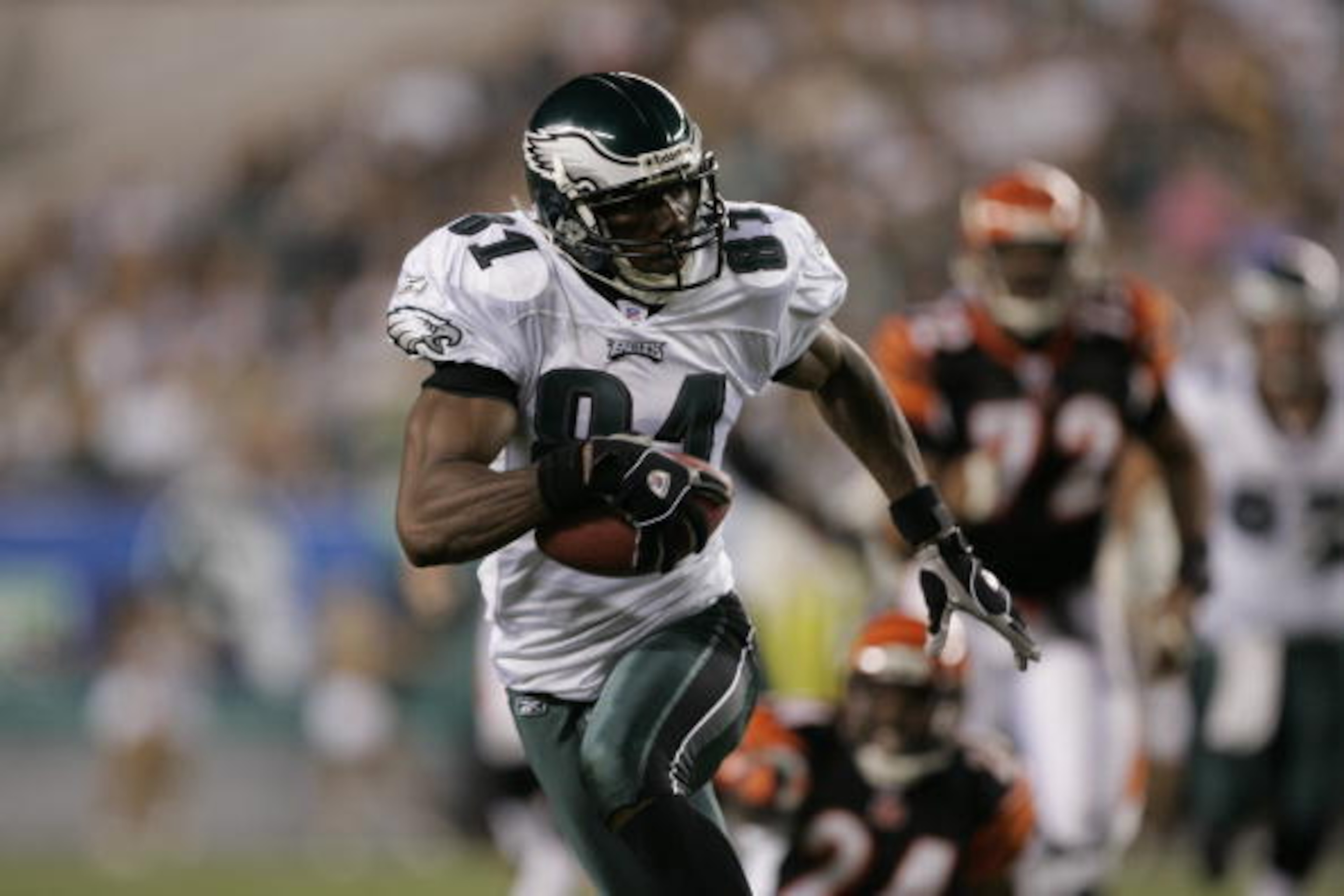 PHILADELPHIA - AUGUST 26: Wide Receiver Terrell Owens #81 of the Philadelphia Eagles runs with the ball at Lincoln Financial Field on August 26, 2005 in Philadelphia, Pennsylvania.  The Philadelphia Eagles defeated the Cincinnati Bengals 27-17. (Photo by 
