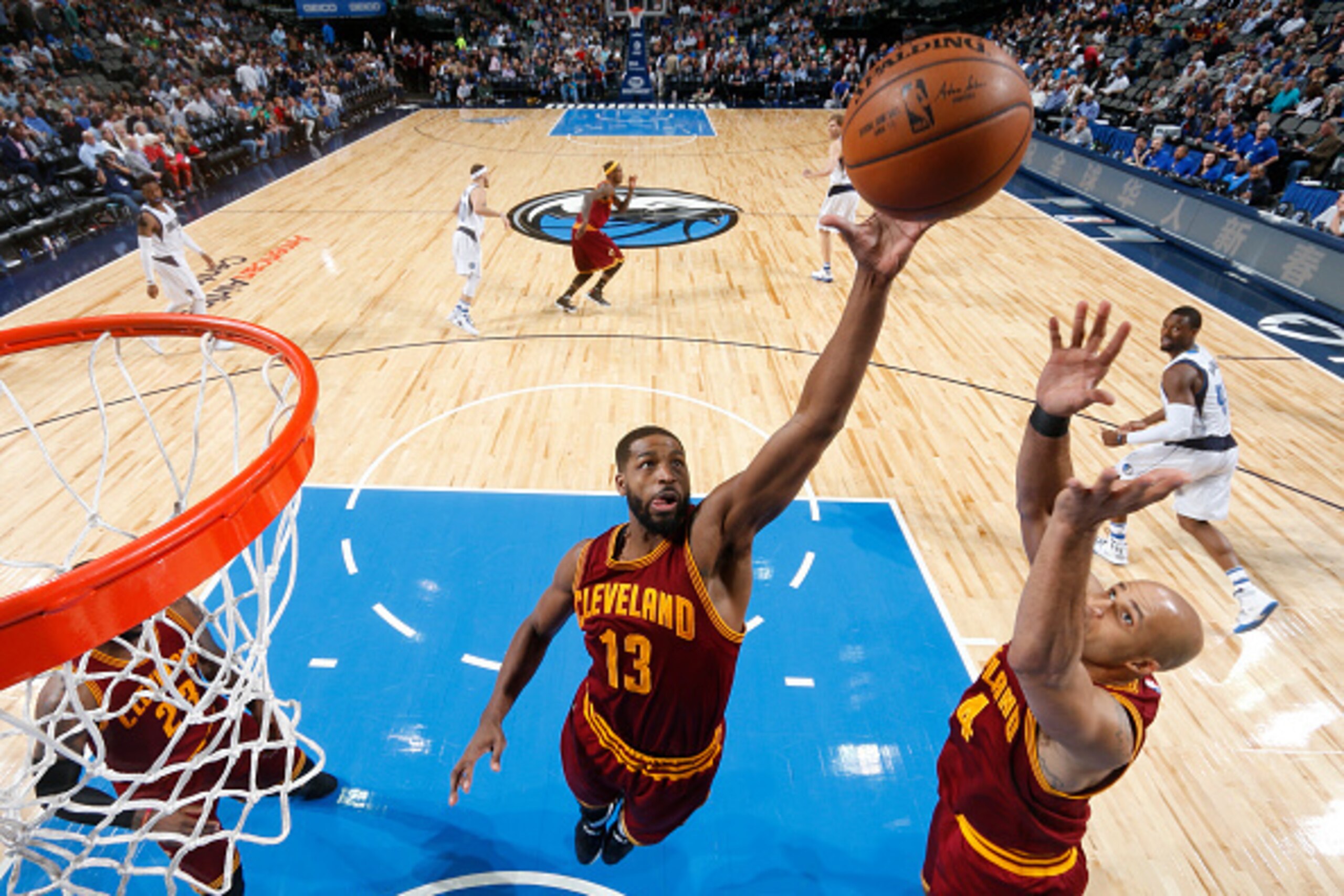 DALLAS, TX - JANUARY 30: Tristan Thompson #13 of the Cleveland Cavaliers grabs a rebound against the Dallas Mavericks on January 30, 2017 at the American Airlines Center in Dallas, Texas. NOTE TO USER: User expressly acknowledges and agrees that, by downl