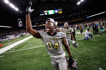 DETROIT, MI - DECEMBER 02: Corey Davis #84 of the Western Michigan Broncos celebrates winning the MAC Championship 29-23 over the Ohio Bobcats on December 2, 2016 at Ford Field in Detroit, Michigan. (Photo by Gregory Shamus/Getty Images)