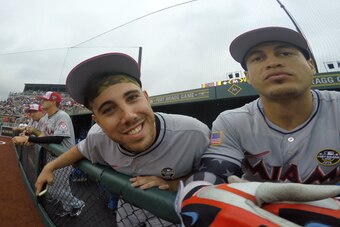 Fernandez and Stanton mug for the camera during a Marlins game played at Fort Bragg in North Carolina last July 3.