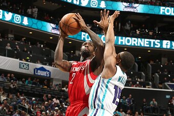 CHARLOTTE, NC - FEBRUARY 9: Patrick Beverley #2 of the Houston Rockets shoots the ball during the game against the Charlotte Hornets on February 9, 2017 at Spectrum Center in Charlotte, North Carolina. NOTE TO USER: User expressly acknowledges and agrees 