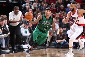 PORTLAND, OR - FEBRUARY 9: Isaiah Thomas #4 of the Boston Celtics drives to the basket against the Portland Trail Blazers on February 9, 2017 at the Moda Center in Portland, Oregon. NOTE TO USER: User expressly acknowledges and agrees that, by downloading