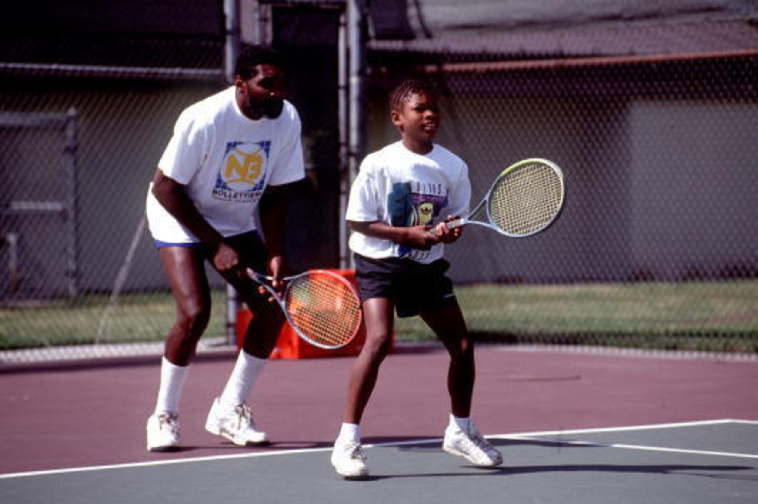 372178 05: FILE PHOTO: Richard Williams practices with his daughter, Serena in 1991 in Compton, CA. Serena and Venus Williams will be playing against each other for the first time July 6, 2000 in the tennis semifinals at Wimbledon. (Photo by Online USA)