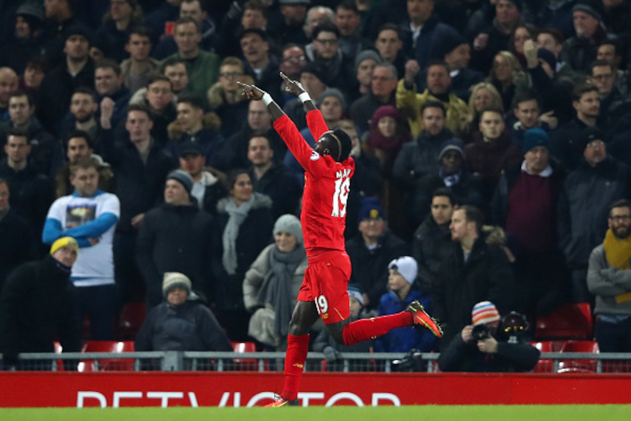 LIVERPOOL, ENGLAND - FEBRUARY 11: Sadio Mane of Liverpool celebrates scoring the opening goal during the Premier League match between Liverpool and Tottenham Hotspur at Anfield on February 11, 2017 in Liverpool, England. (Photo by Clive Brunskill/Getty LIVERPOOL, ENGLAND - FEBRUARY 11: Sadio Mane of Liverpool celebrates scoring the opening goal during the Premier League match between Liverpool and Tottenham Hotspur at Anfield on February 11, 2017 in Liverpool, England. (Photo by Clive Brunskill/Getty
