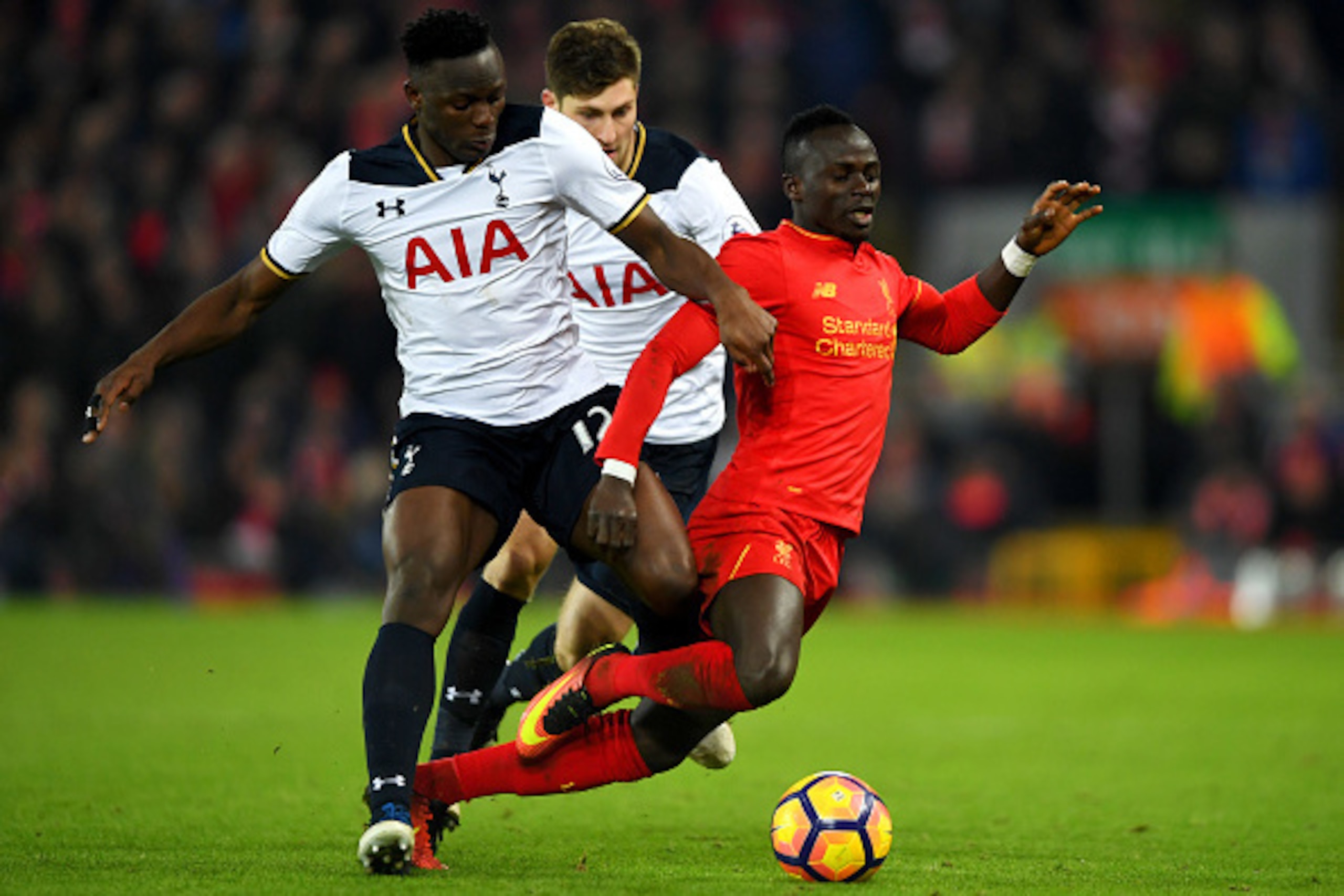 LIVERPOOL, ENGLAND - FEBRUARY 11: Sadio Mane of Liverpool and Victor Wanyama of Tottenham Hotspur compete for the ball during the Premier League match between Liverpool and Tottenham Hotspur at Anfield on February 11, 2017 in Liverpool, England. (Photo LIVERPOOL, ENGLAND - FEBRUARY 11: Sadio Mane of Liverpool and Victor Wanyama of Tottenham Hotspur compete for the ball during the Premier League match between Liverpool and Tottenham Hotspur at Anfield on February 11, 2017 in Liverpool, England. (Photo