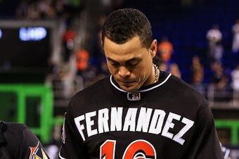 MIAMI, FL - SEPTEMBER 26: Giancarlo Stanton walks off the field after the game against the New York Mets at Marlins Park on September 26, 2016 in Miami, Florida. The entire Miami Marlins team wore Jose Fernandez jerseys in honor of the late pitcher. (Phot