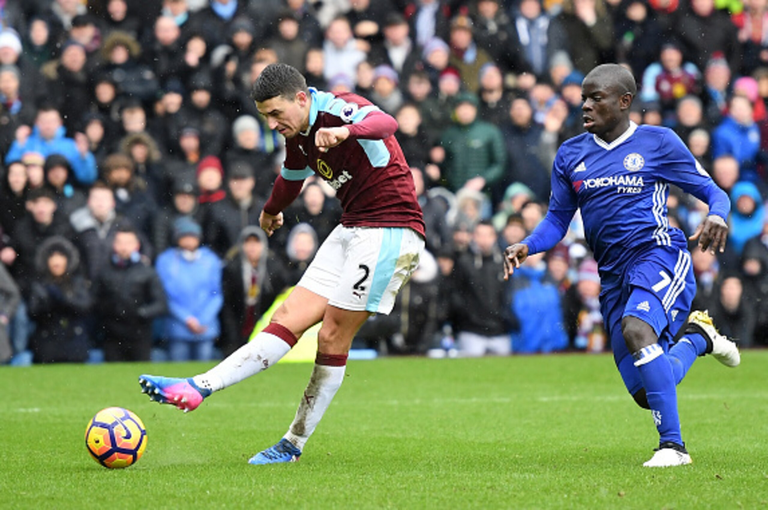 BURNLEY, ENGLAND - FEBRUARY 12: Matthew Lowton of Burnley takes a shot on goal as he is closed down by N'Golo Kante of Chelsea during the Premier League match between Burnley and Chelsea at Turf Moor on February 12, 2017 in Burnley, England. (Photo by M BURNLEY, ENGLAND - FEBRUARY 12: Matthew Lowton of Burnley takes a shot on goal as he is closed down by N'Golo Kante of Chelsea during the Premier League match between Burnley and Chelsea at Turf Moor on February 12, 2017 in Burnley, England. (Photo by M