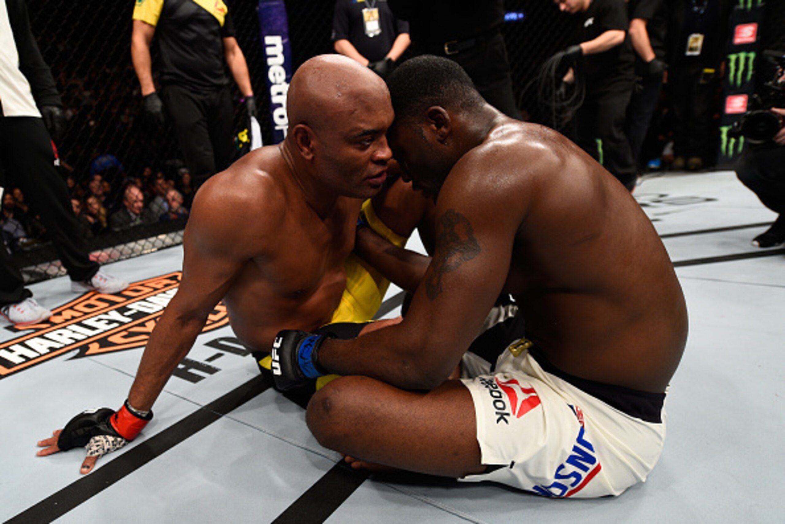 BROOKLYN, NEW YORK - FEBRUARY 11:  (L-R) Anderson Silva of Brazil and Derek Brunson embrace after their middleweight bout during the UFC 208 event inside Barclays Center on February 11, 2017 in Brooklyn, New York. (Photo by Jeff Bottari/Zuffa LLC/Zuffa LL