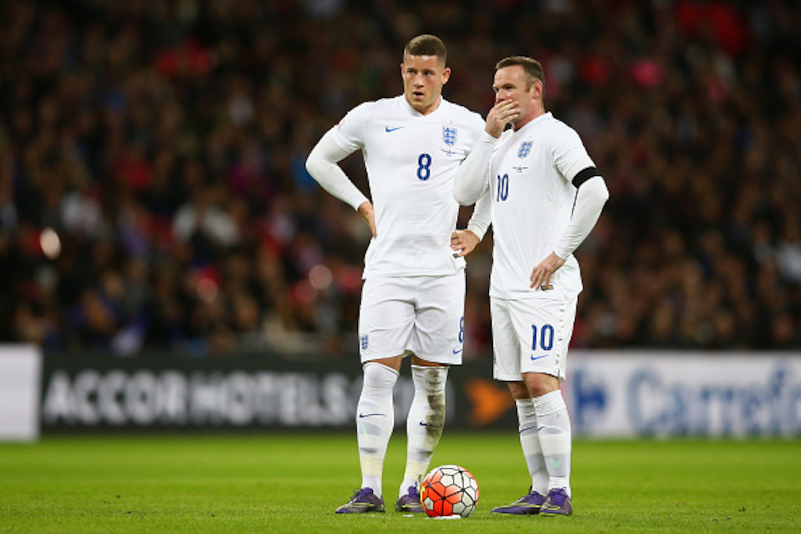 LONDON, ENGLAND - NOVEMBER 17: Wayne Rooney (R) and Ross Barkley (L) of England discuss at a free kick during the International Friendly match between England and France at Wembley Stadium on November 17, 2015 in London, England.  (Photo by Paul Gilham/Ge