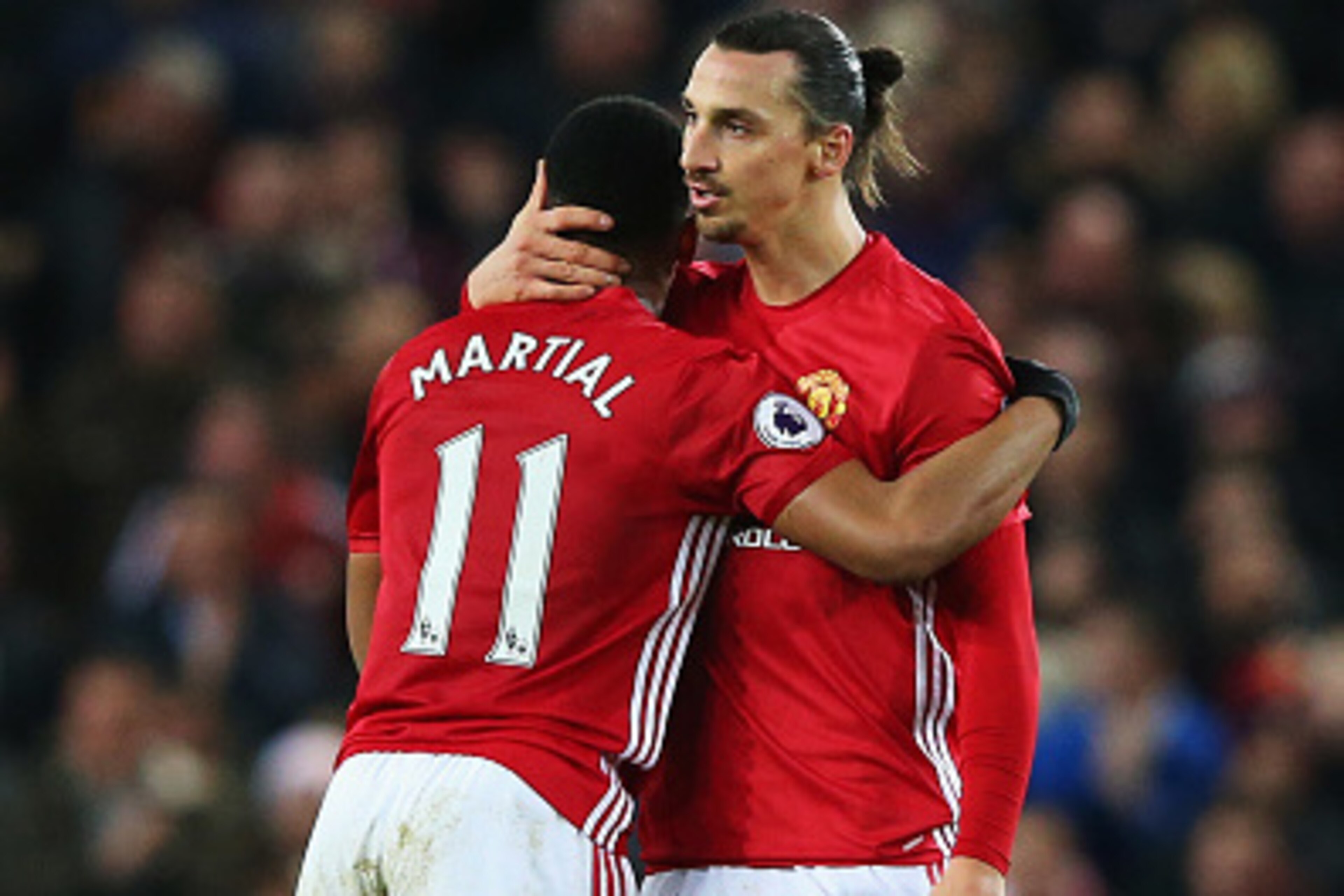 MANCHESTER, ENGLAND - DECEMBER 31:  Anthony Martial of Manchester United celebrates after he scores a goal with team mate Zlatan Ibrahimovic during the Premier League match between Manchester United and Middlesbrough at Old Trafford on December 31, 2016 i