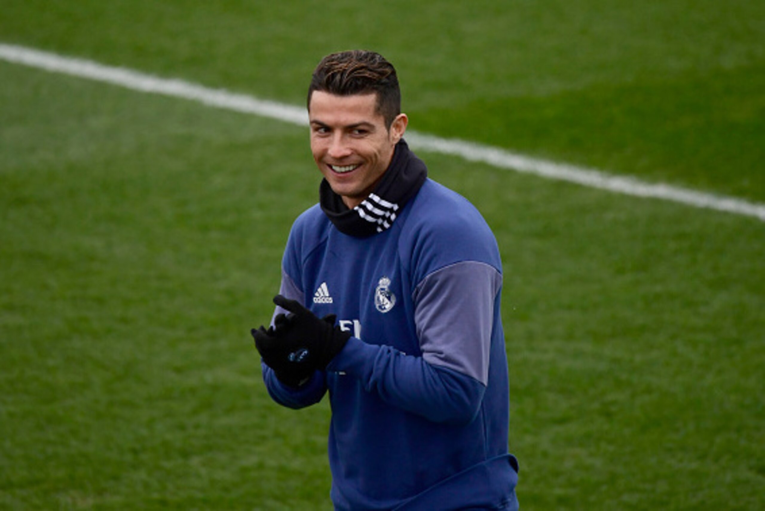 Real Madrid's Portuguese forward Cristiano Ronaldo smiles as he attends a training session at Valdebebas Sport City in Madrid on February 10, 2017 on the eve of their Liga football match against Osasuna. / AFP / PIERRE-PHILIPPE MARCOU        (Photo credit