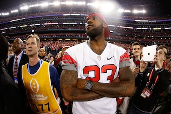 ARLINGTON, TX - JANUARY 12:  LeBron James of the Cleveland Cavaliers looks on after the Ohio State Buckeyes defeated the Oregon Ducks 42 to 20 in the College Football Playoff National Championship Game at AT&T Stadium on January 12, 2015 in Arlington, Tex