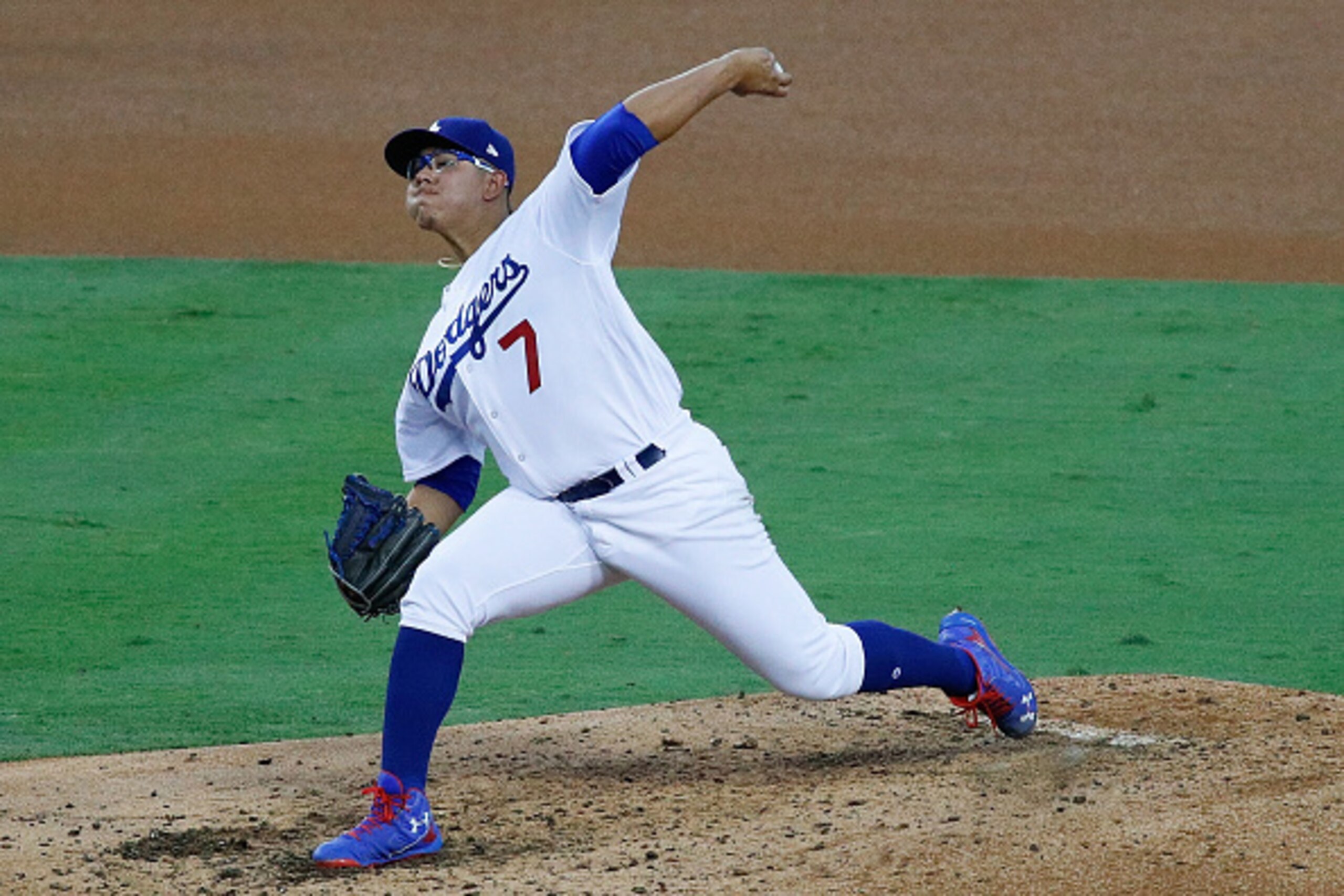 LOS ANGELES, CA - OCTOBER 19:  Julio Urias #7 of the Los Angeles Dodgers delivers a pitch against the Chicago Cubs in game four of the National League Championship Series at Dodger Stadium on October 19, 2016 in Los Angeles, California.  (Photo by Josh Le