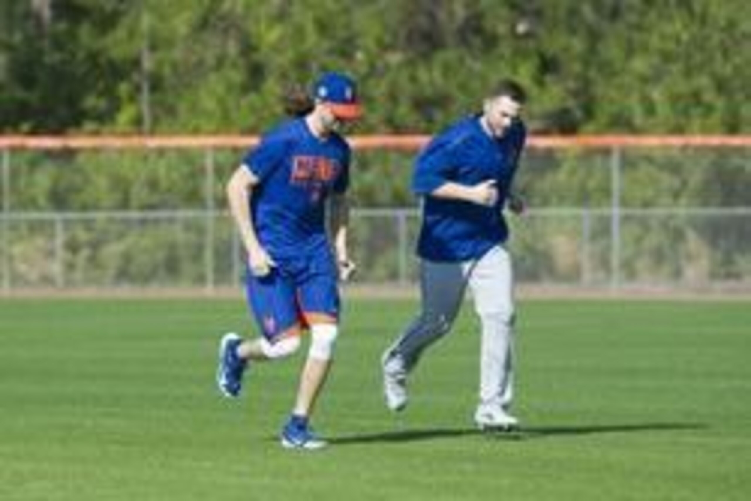 Feb 6, 2017; Port St. Lucie, FL, USA; New York Mets players Jacob deGrom (L) and David Wright (R) run during the first day of practice at Tradition Field. Mandatory Credit: Leah Voss/Treasure Coast Newspapers via USA TODAY Sports