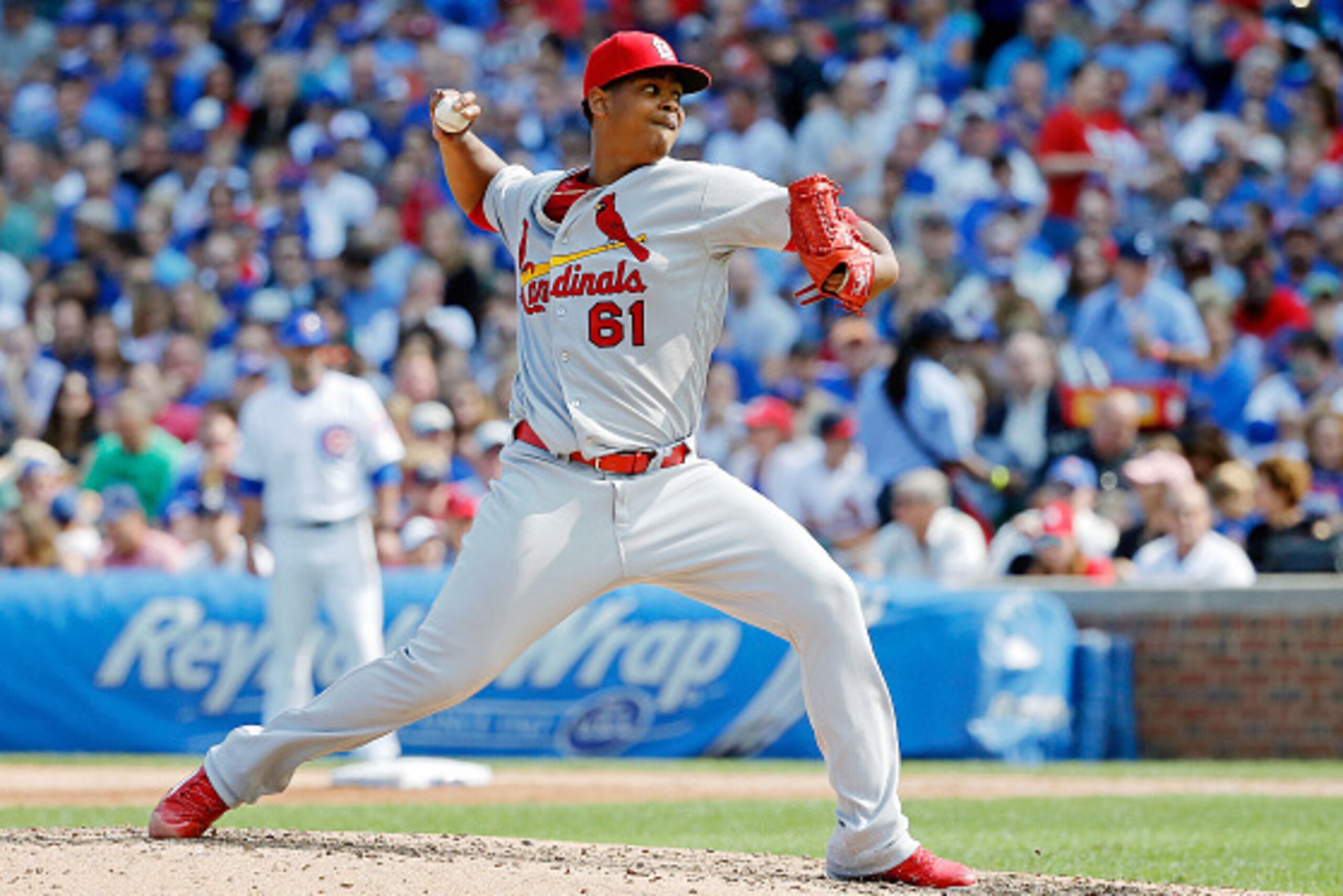 CHICAGO, IL - SEPTEMBER 24: Alex Reyes #61 of the St. Louis Cardinals against the Chicago Cubs during the fifth inning at Wrigley Field on September 24, 2016 in Chicago, Illinois.  (Photo by Jon Durr/Getty Images)